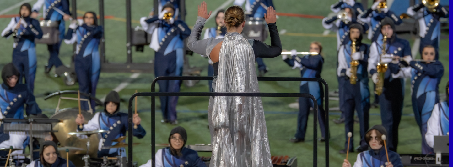 band performance with conductor in the forefront