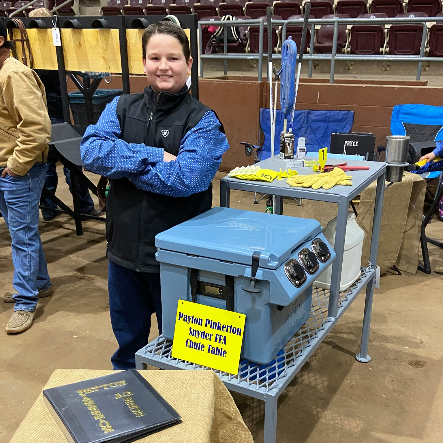FFA student standing by table
