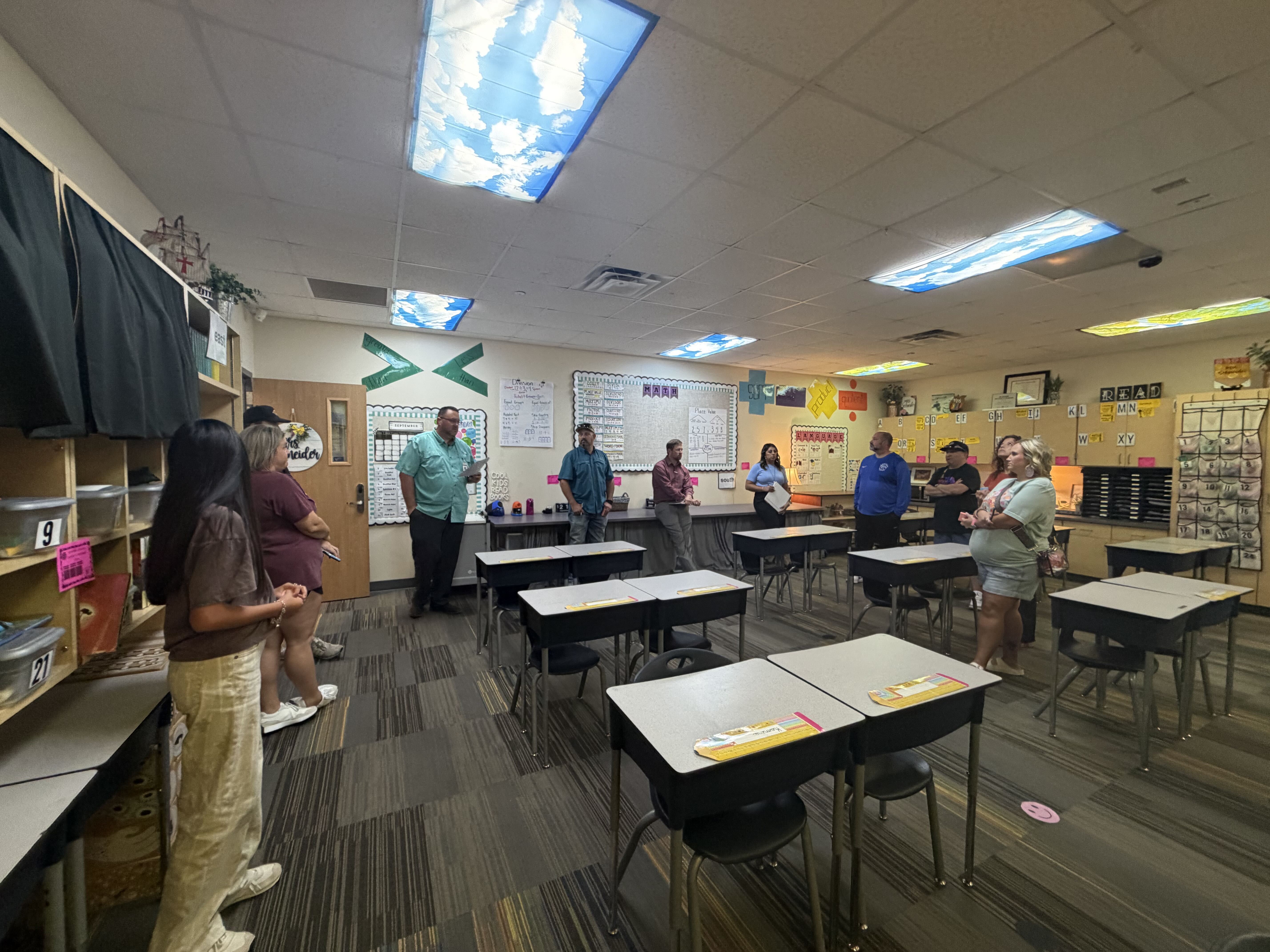 Committee members tours an SISD classroom