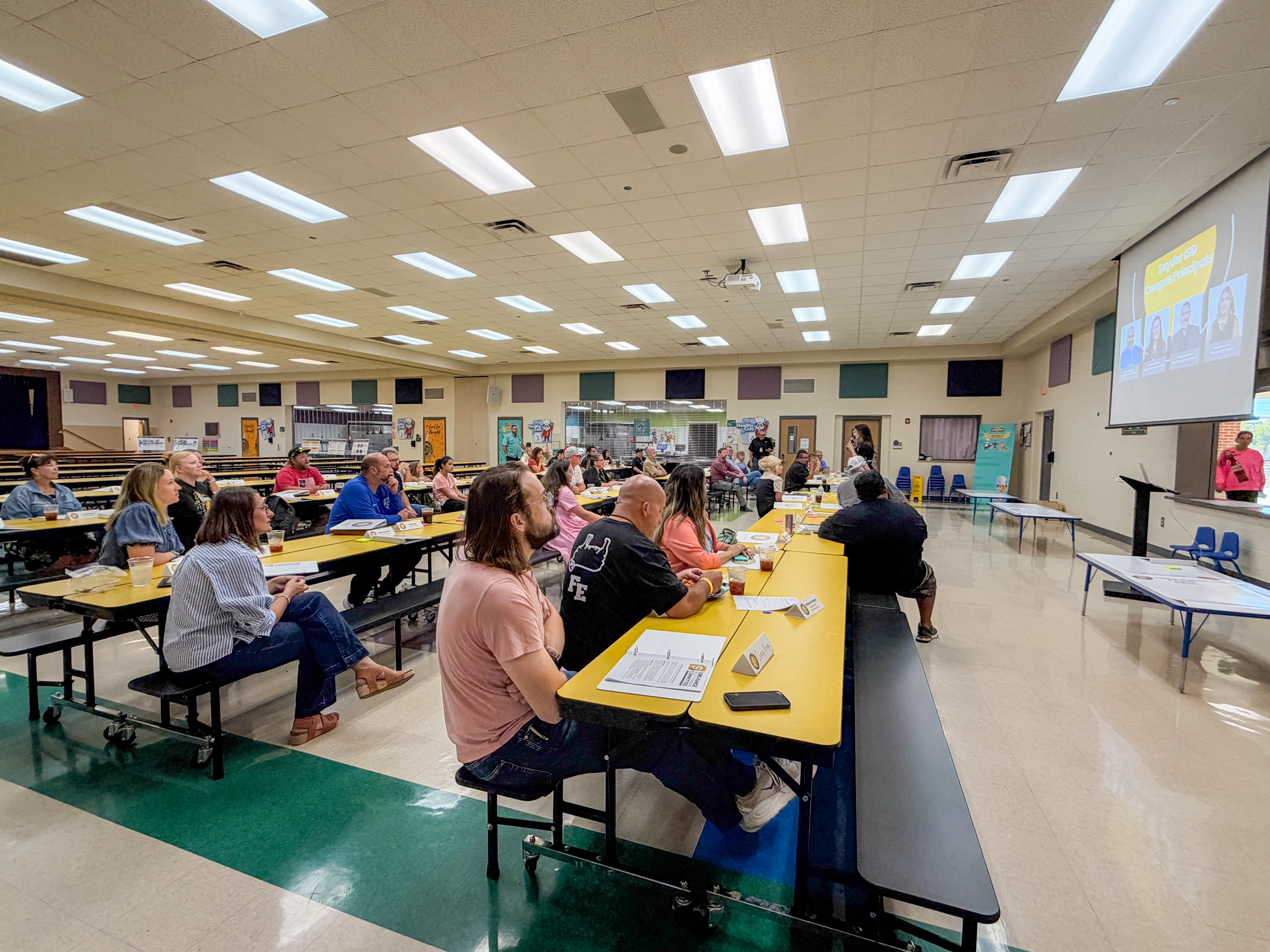Image of Committee meeting in cafeteria