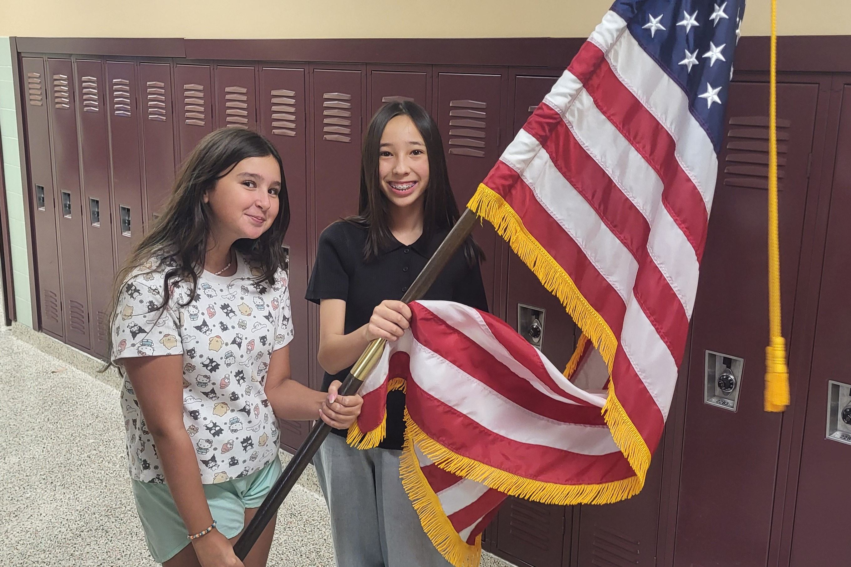 two JH students with american flag