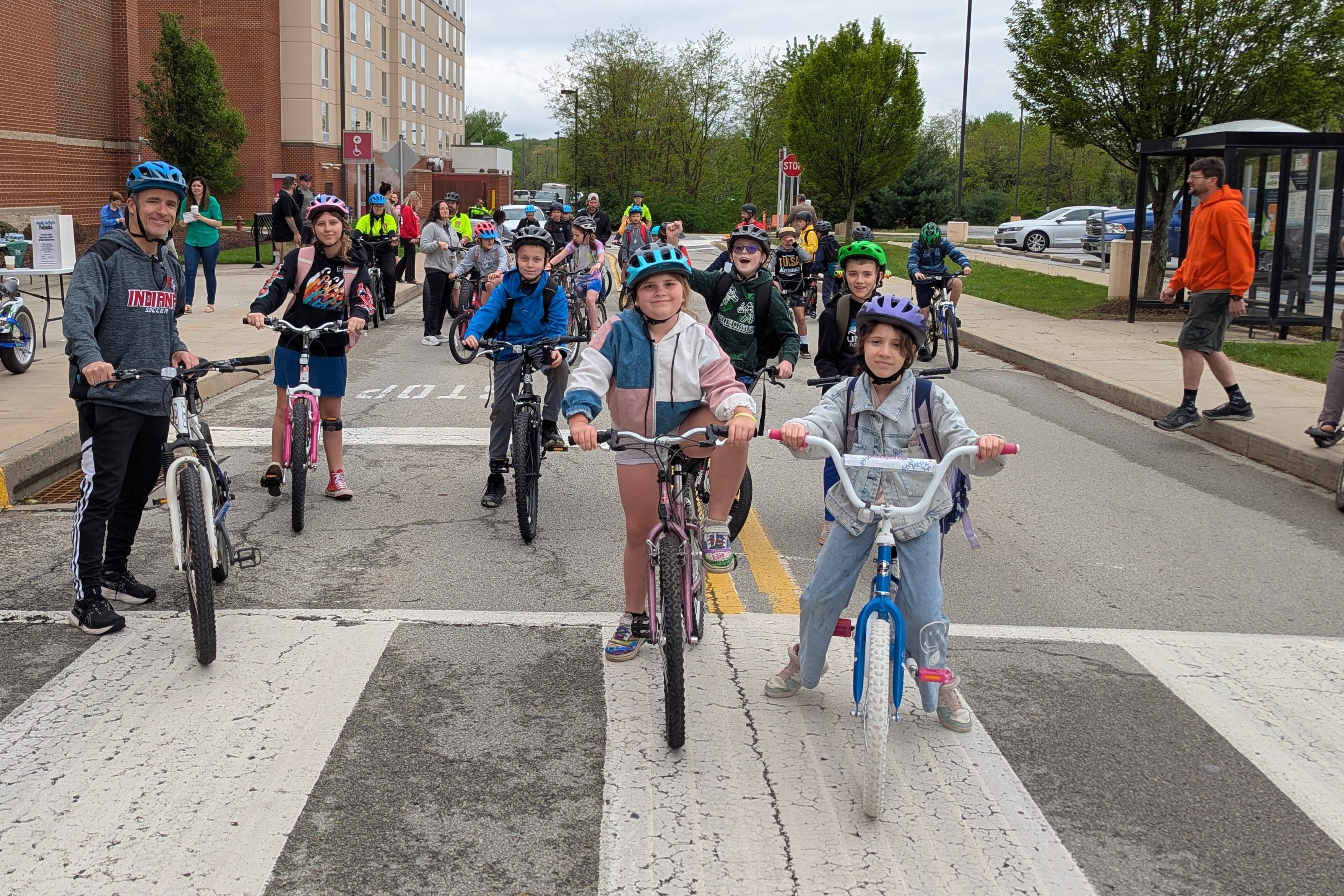 Bike to School day showing several students on bicycles.