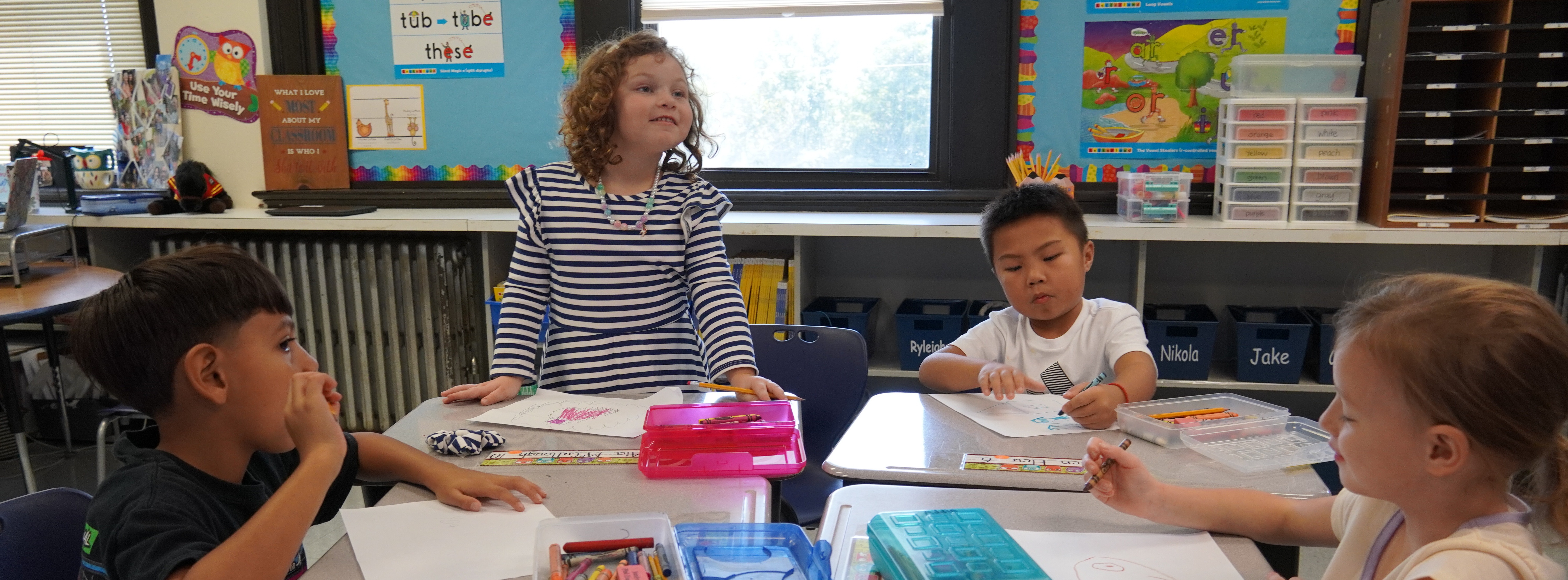 Students learn inside a classroom.