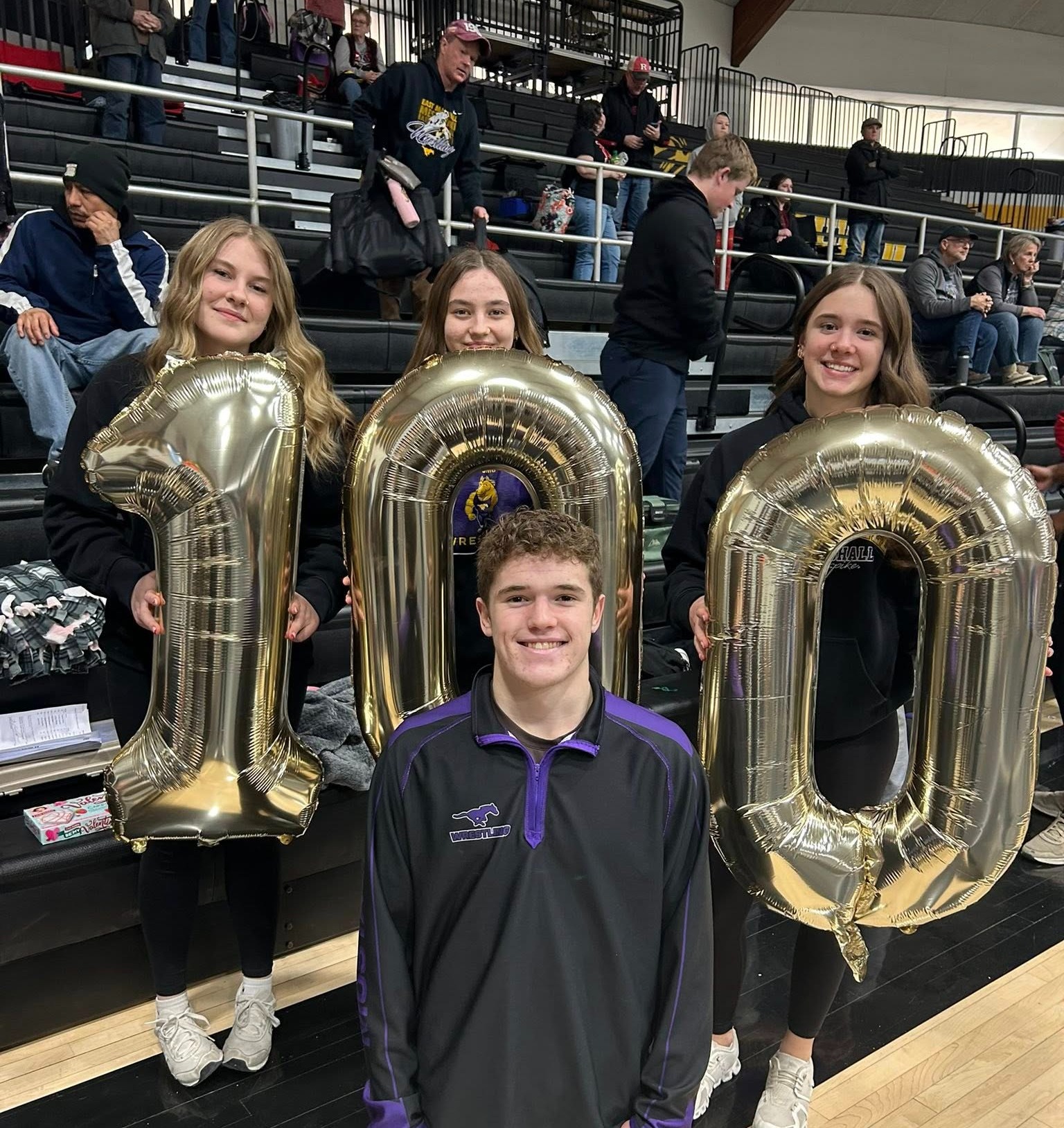 Students holding balloons
