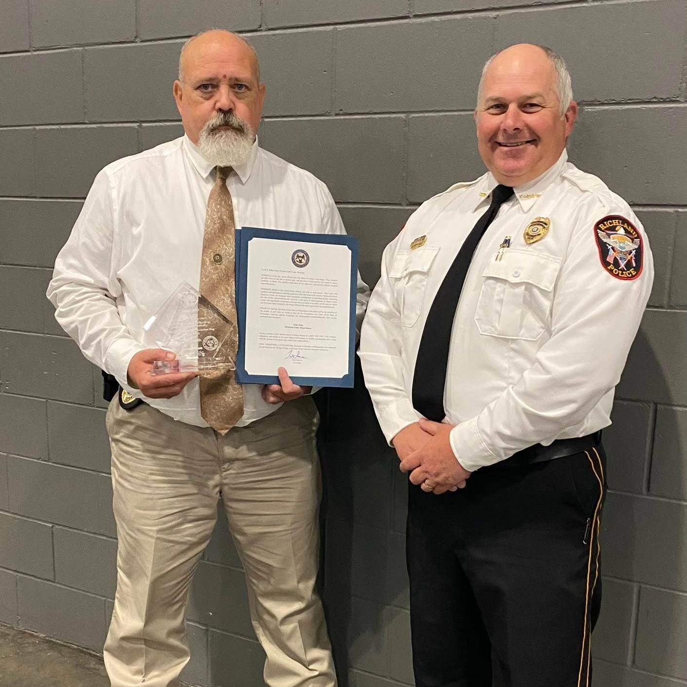 Detective lieutenant John King receiving his Top Cop Award