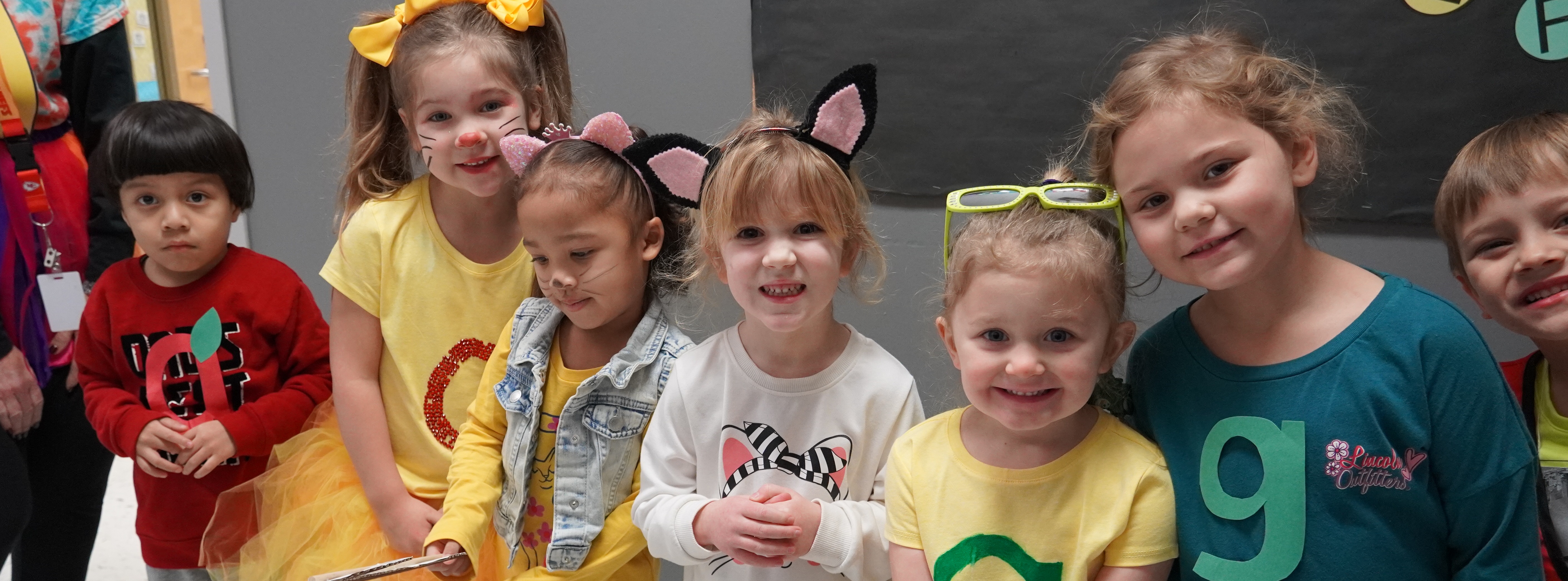 students dressed as characters from Letterland