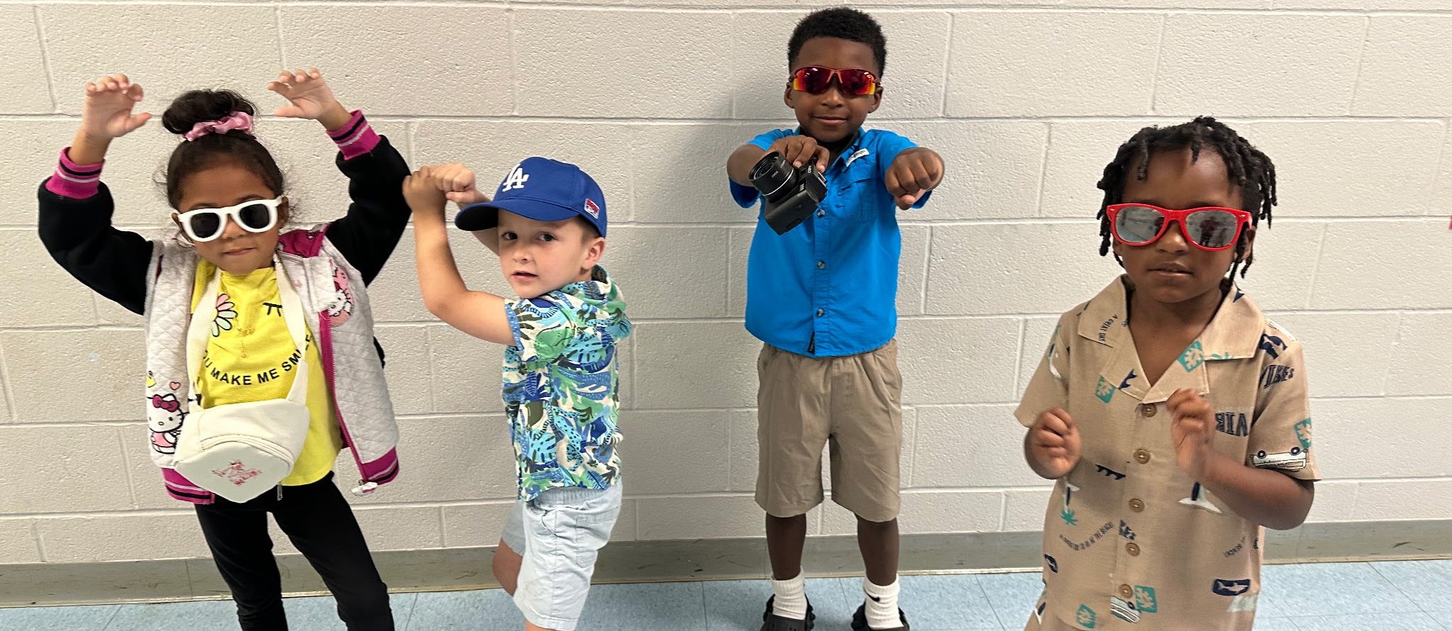 Crystal Hill MAR Slider of kids in vacation garb