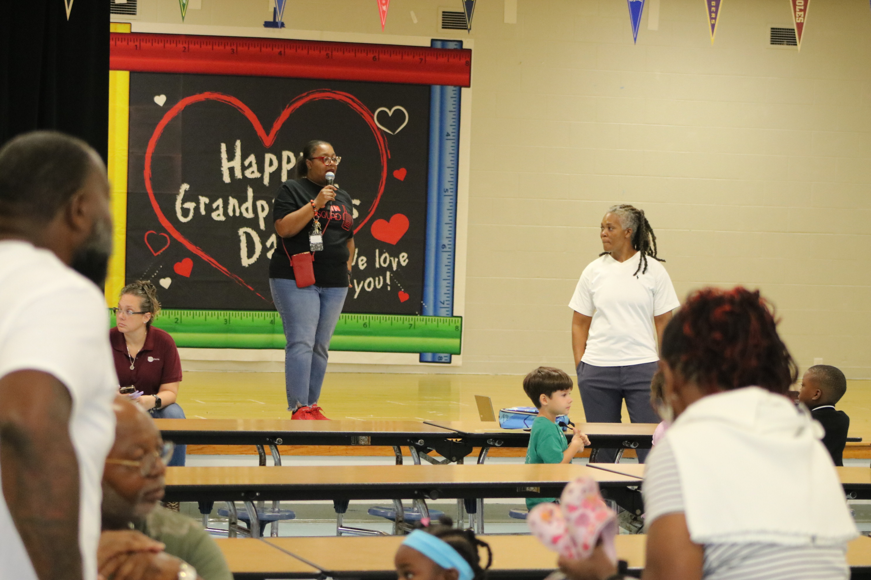 Principal Brown speaking to a Grandparents Day crowd