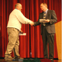 teacher receiving award