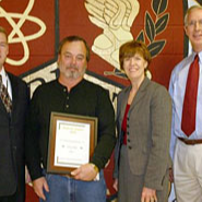 2008 Beacon Award recipient and other staff taking picture