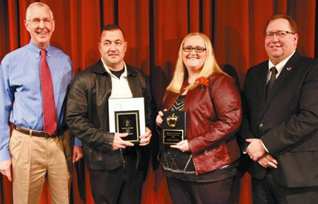 The 2015 Teacher of the Year and Beacon Award recipient receiving award