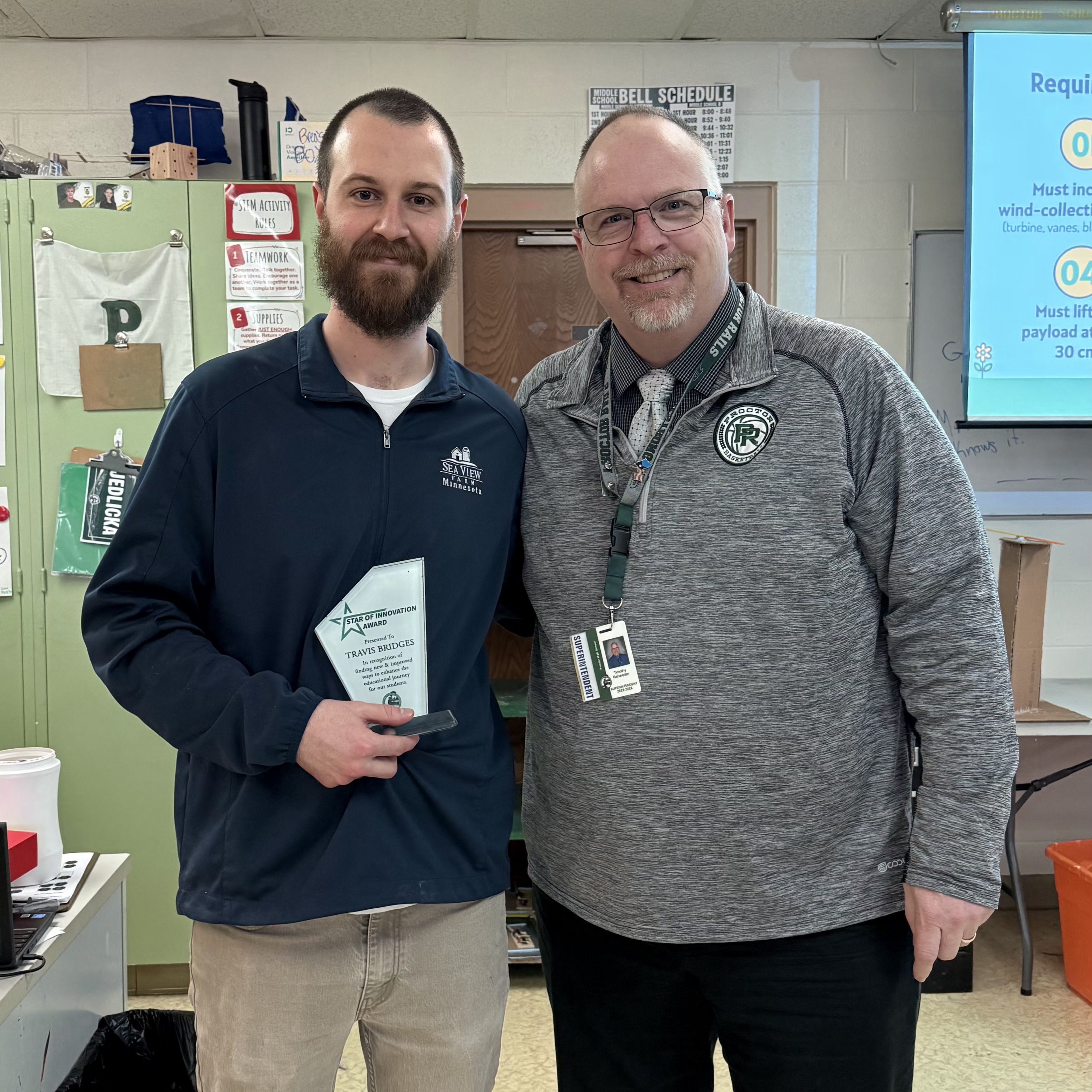 Travis Bridges with Superintendent Rohweder with Star of Innovation Award