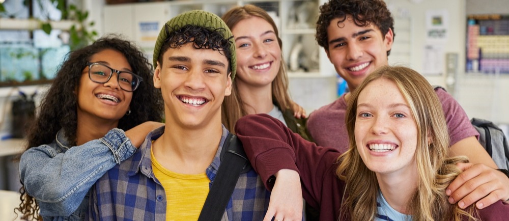 students smiling in classroom