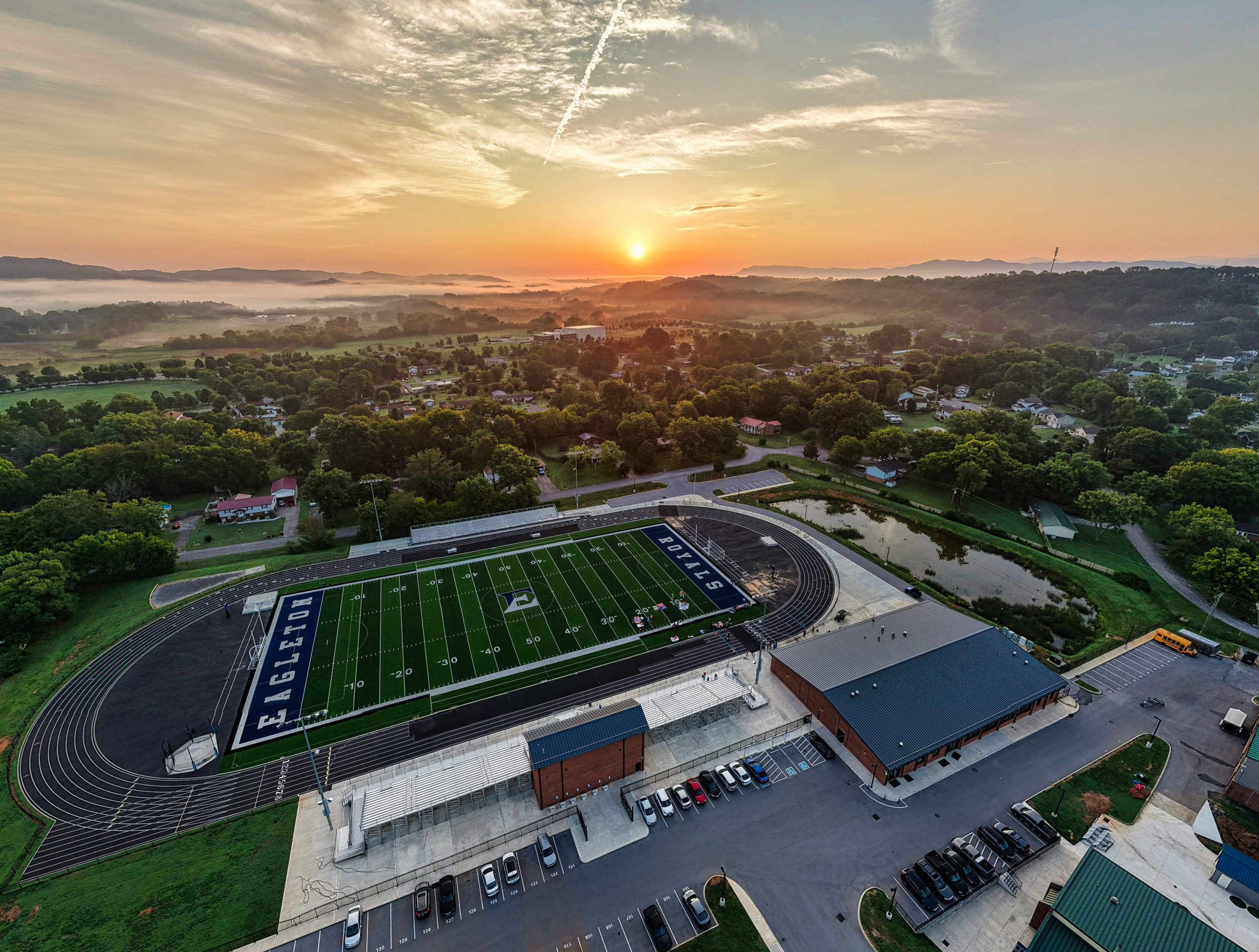 sunrise photo above football field
