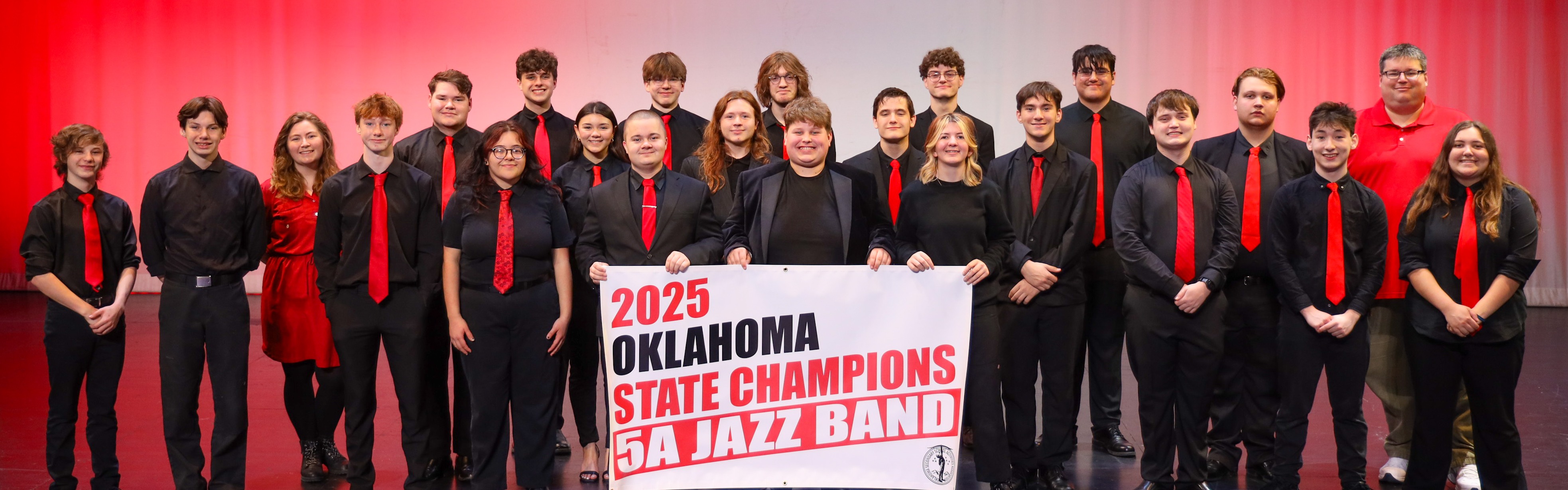 Jazz band with state championship banner