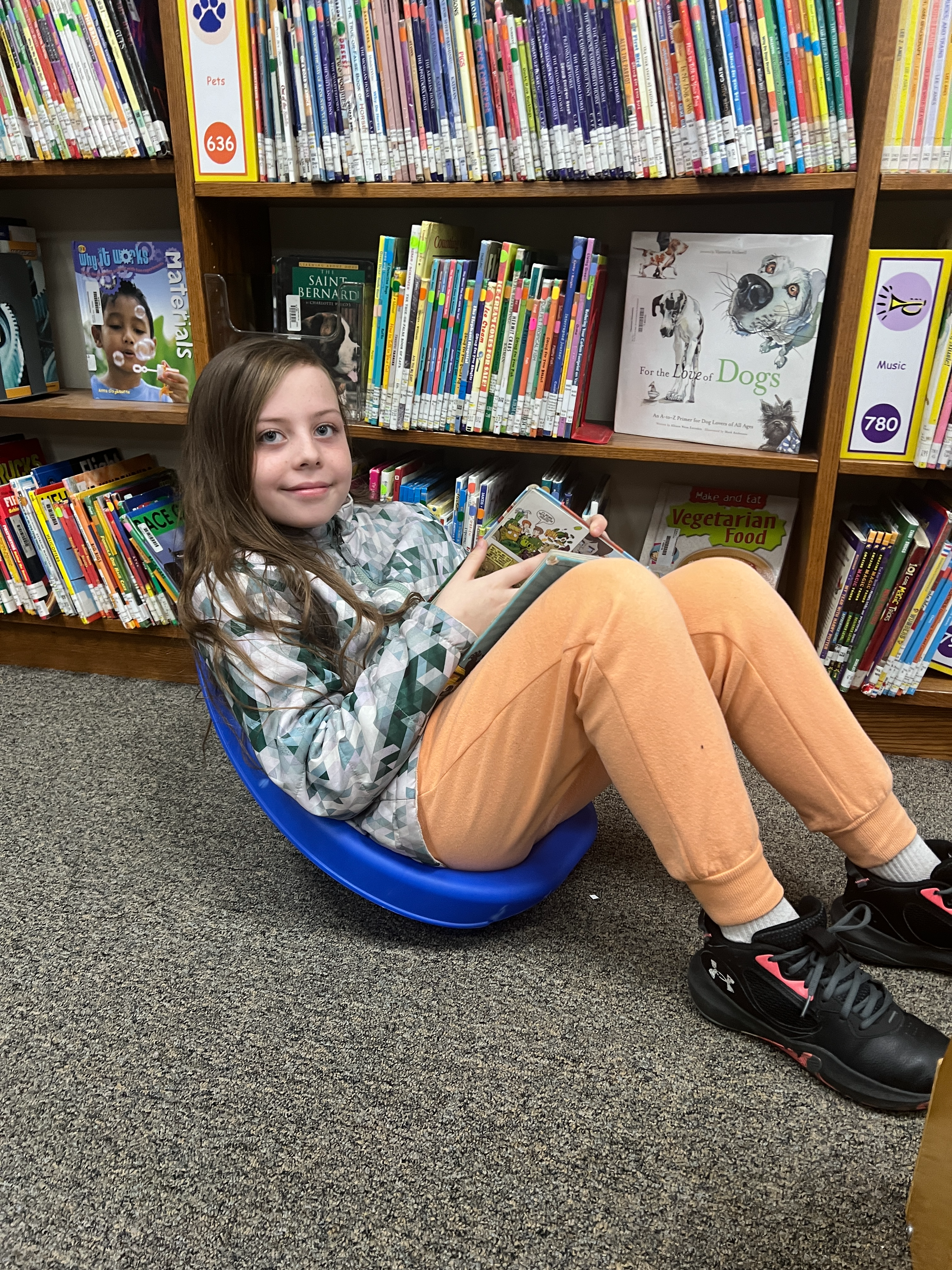 student reading in the Claremont Library.  please see link below for catalog 