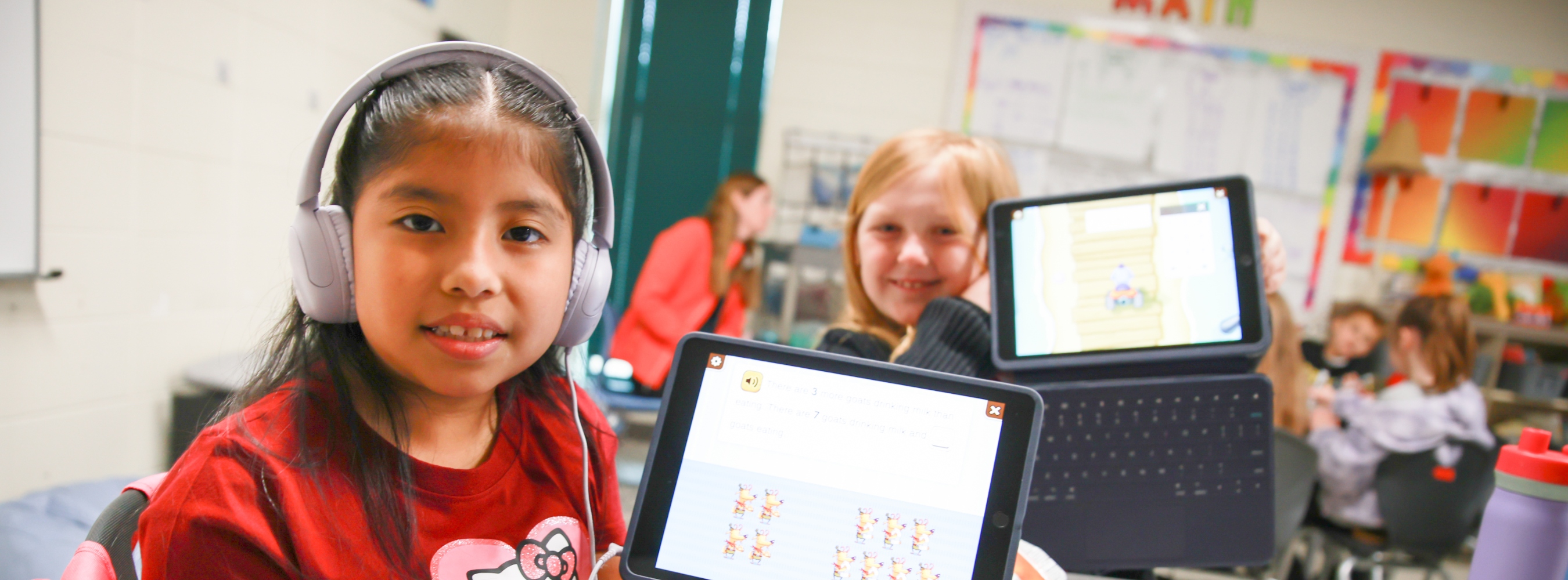 Chesnee Elementary School students smiling with iPad.