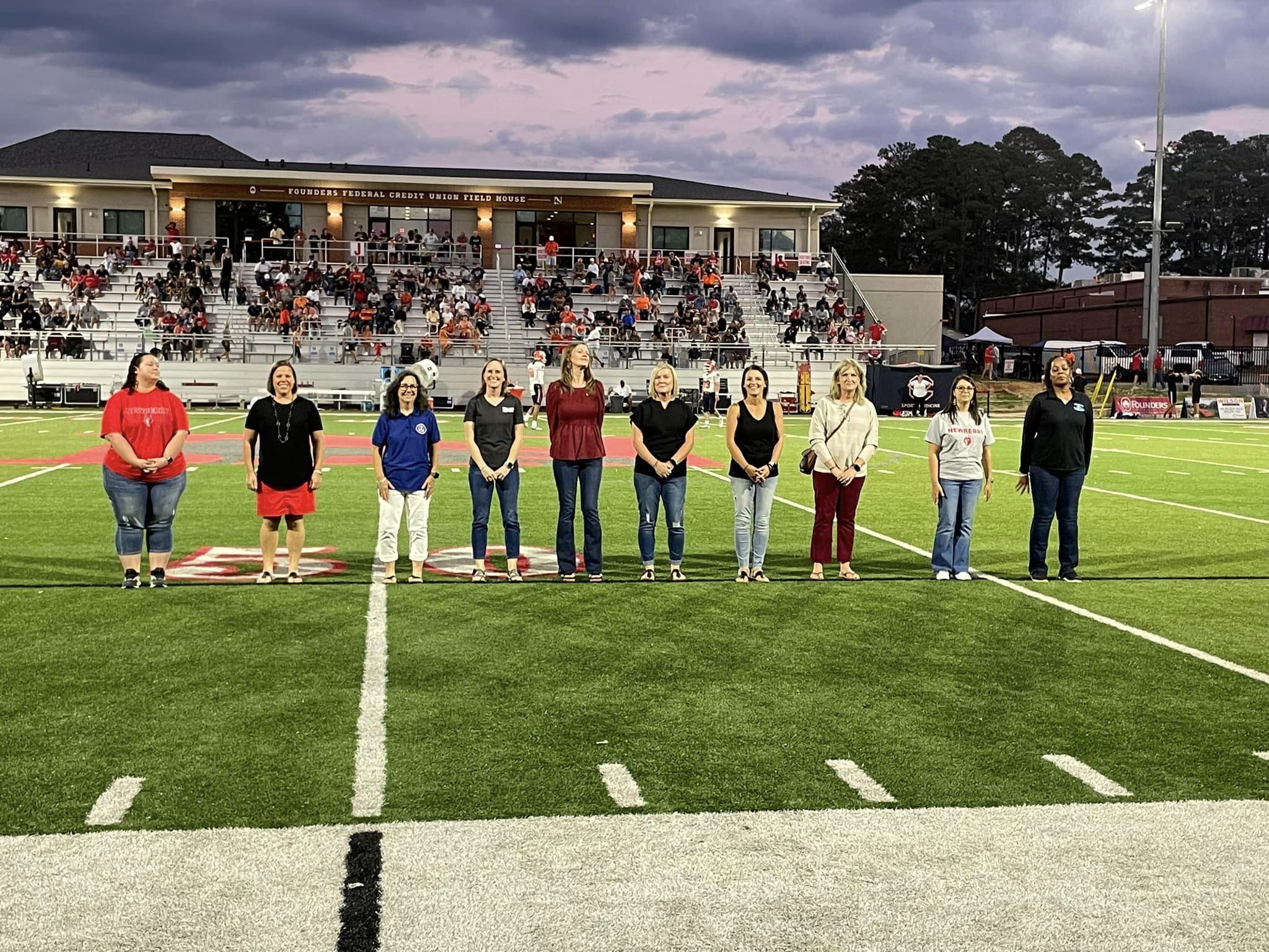 School Teachers of the Year were recognized at halftime.