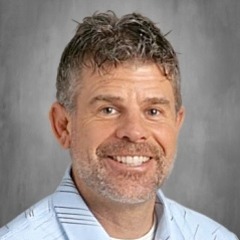 John Droubie, Principal of Riverside Academy