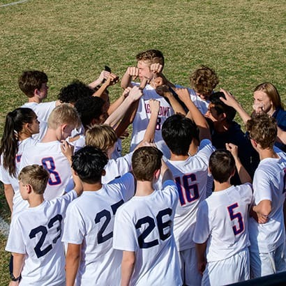 Soccer Team fist bump