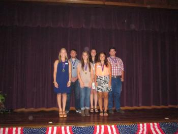 A photo of the foundation members along with the students who have been given the scholarships.