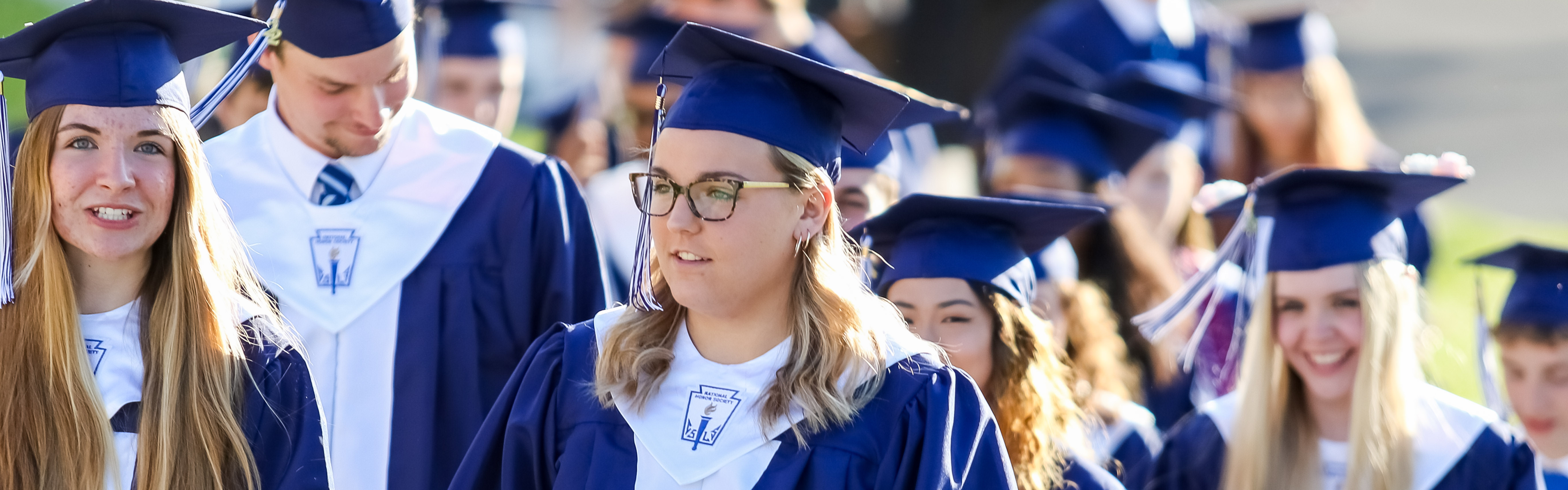 Photo of Students Walking at Graduation