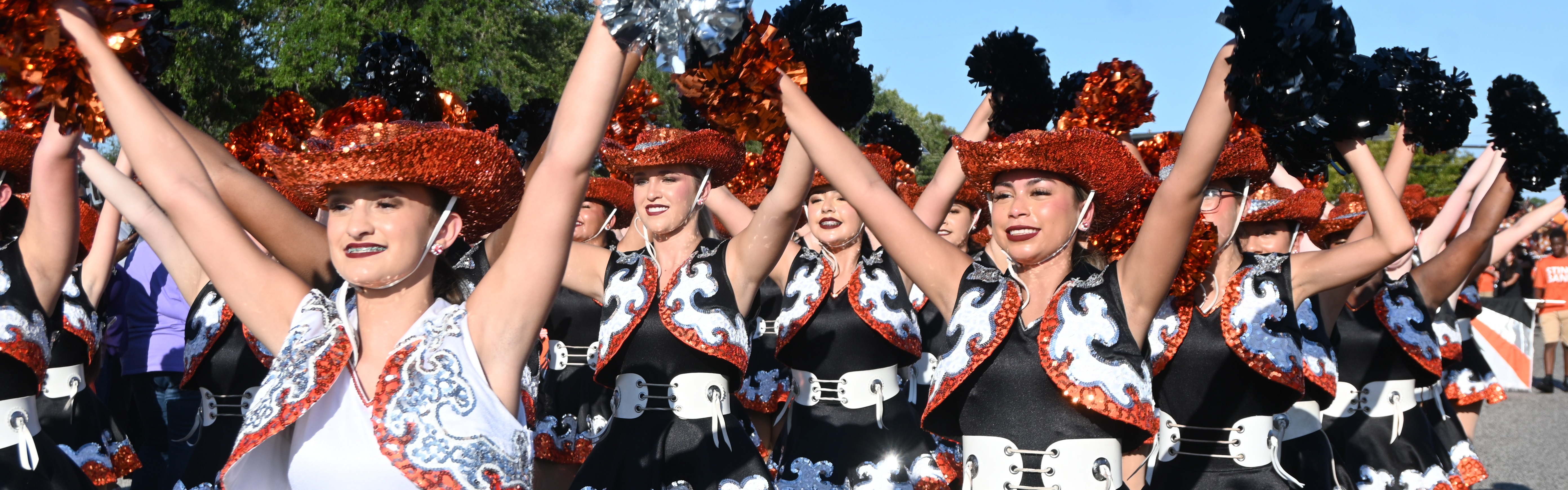 drill team marches at parade