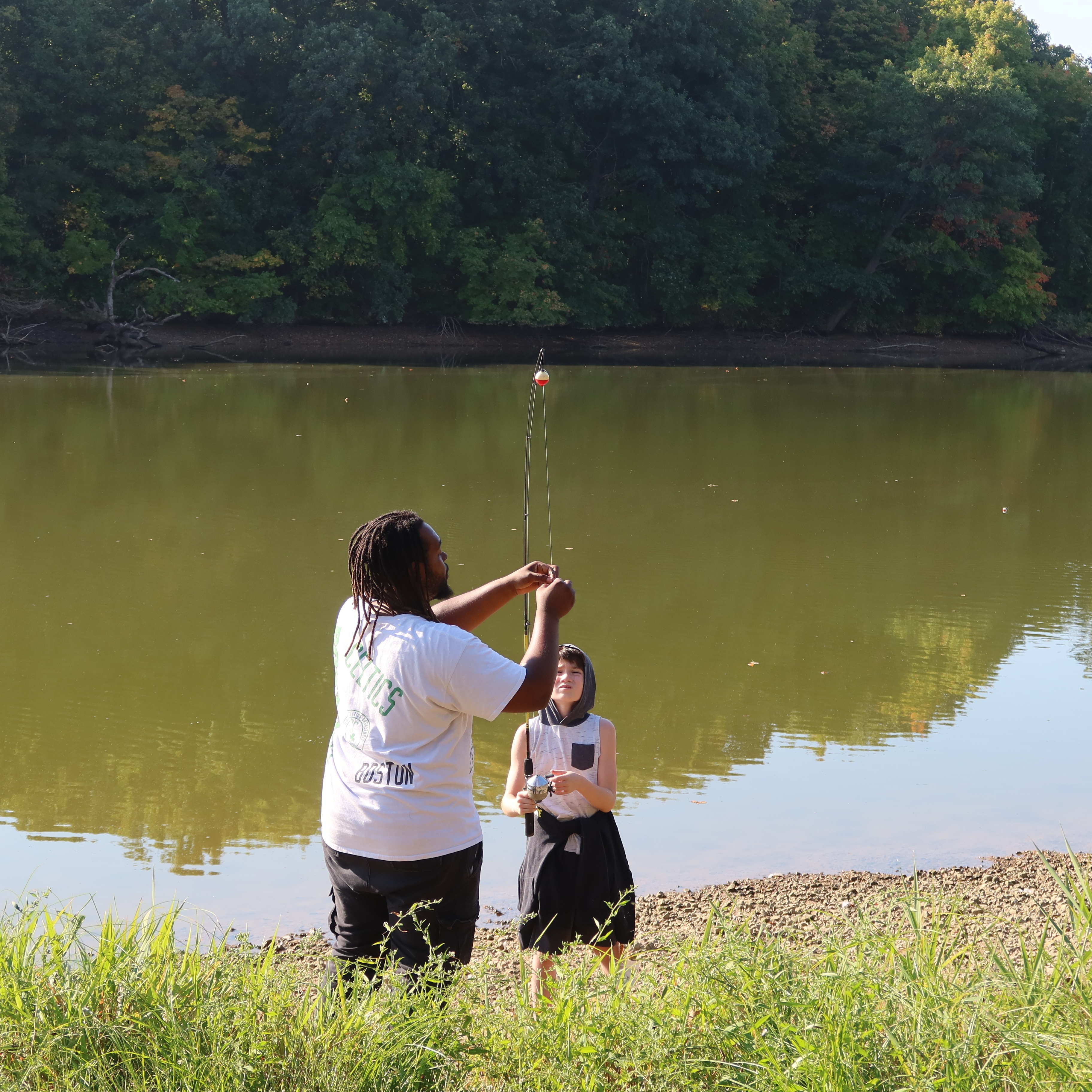 SAFE staff member helps a student during Outdoor Education Day