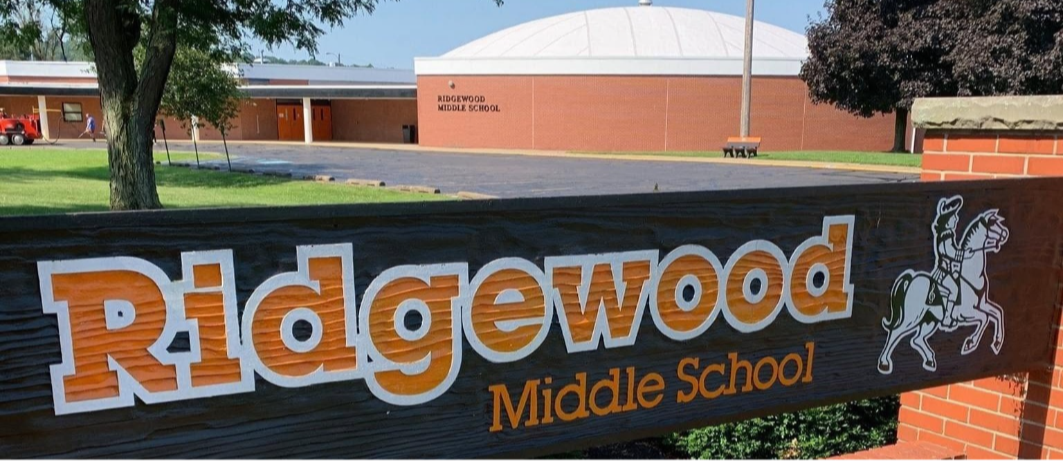 image of the middle school building and sign