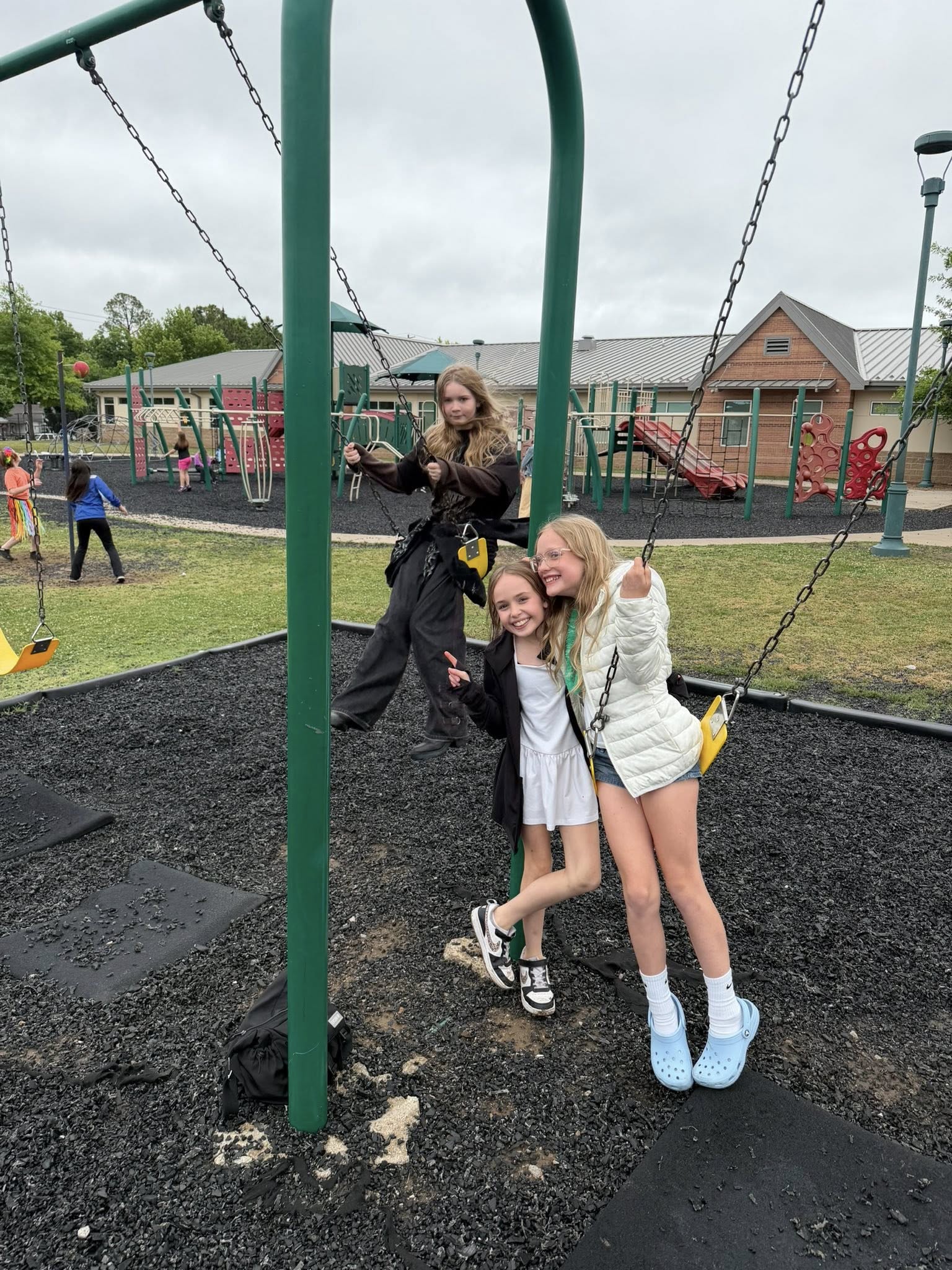 Two girls at the school playground