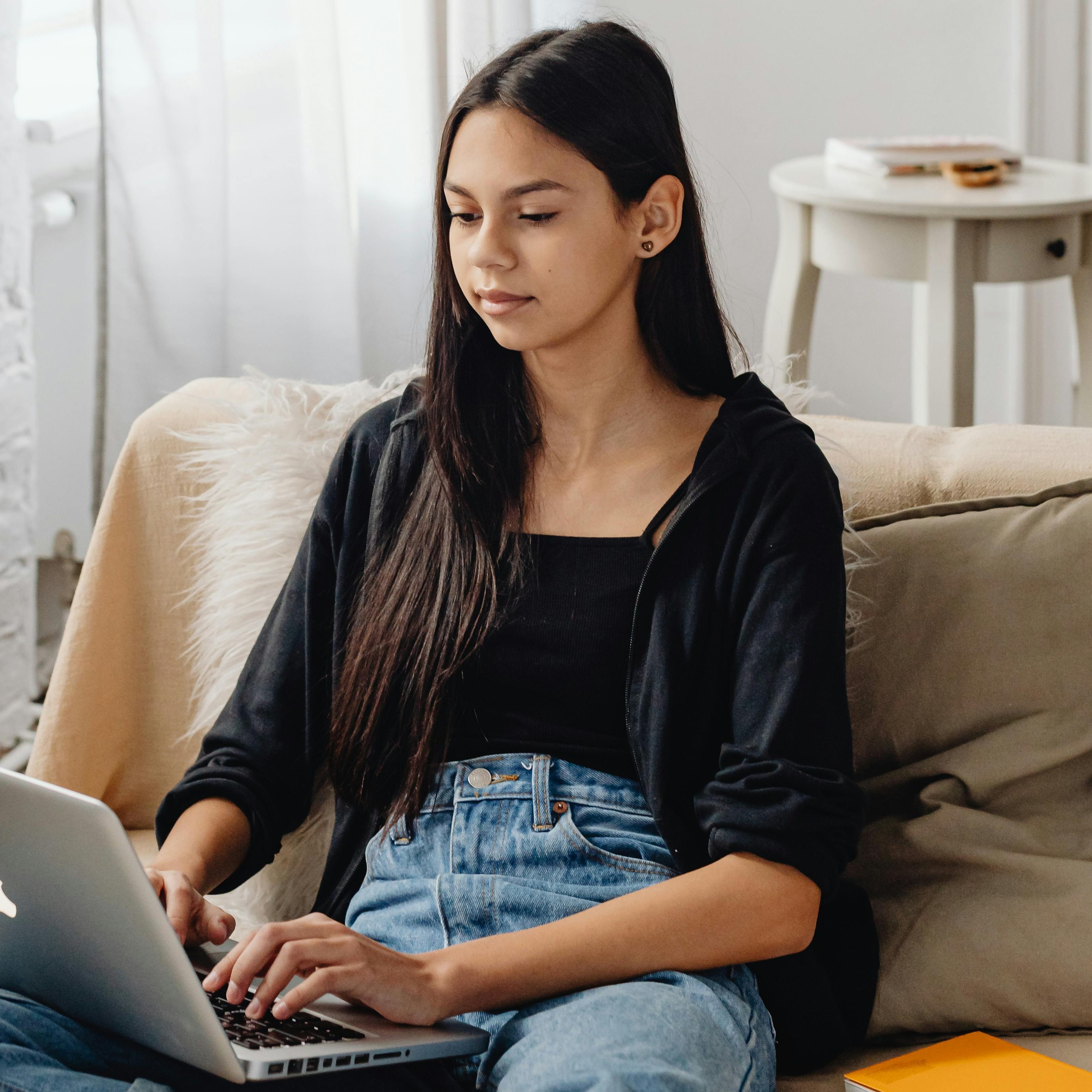 Girl on computer at home
