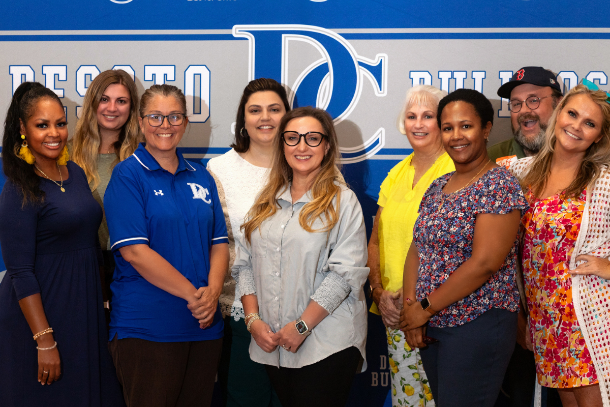 group of staff posing for picture