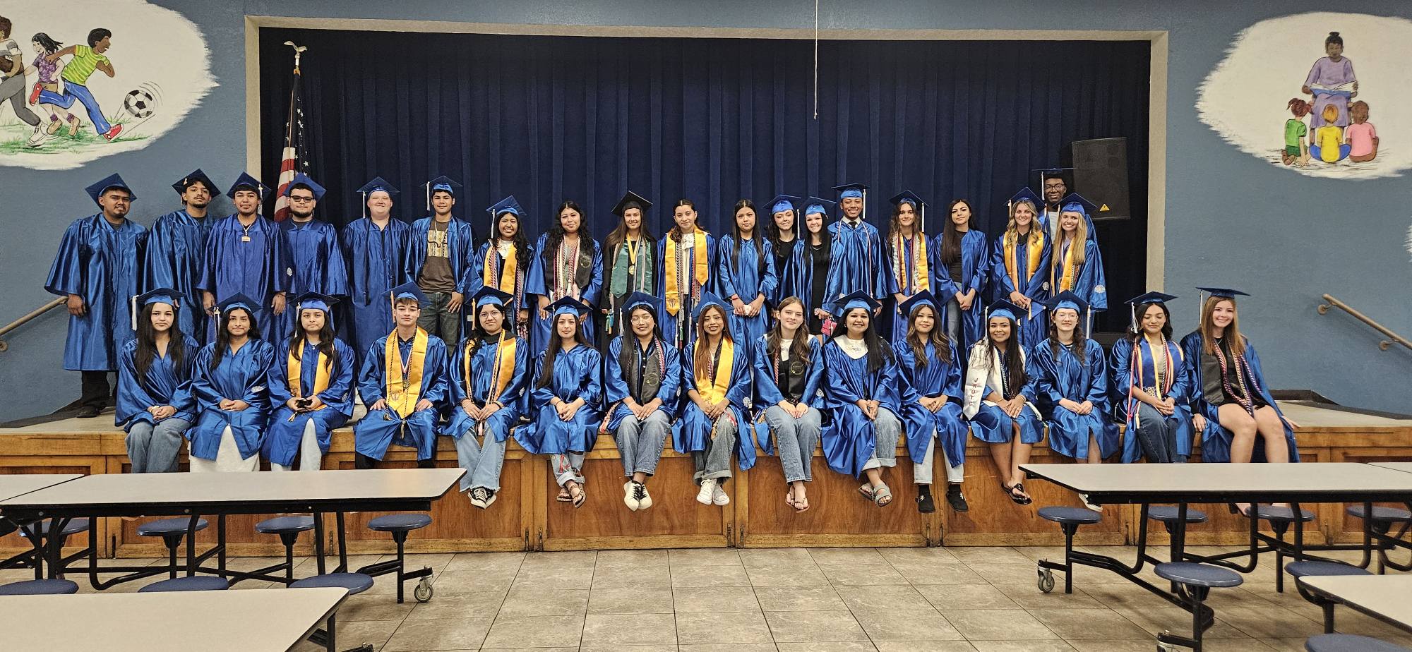 group of students in cap and gowns