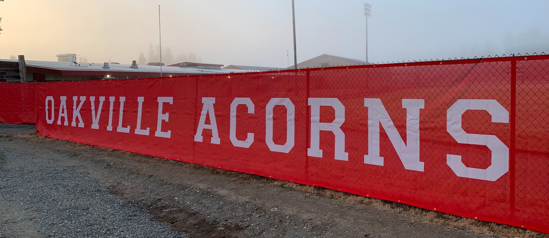 Oakville acorns banner on fence