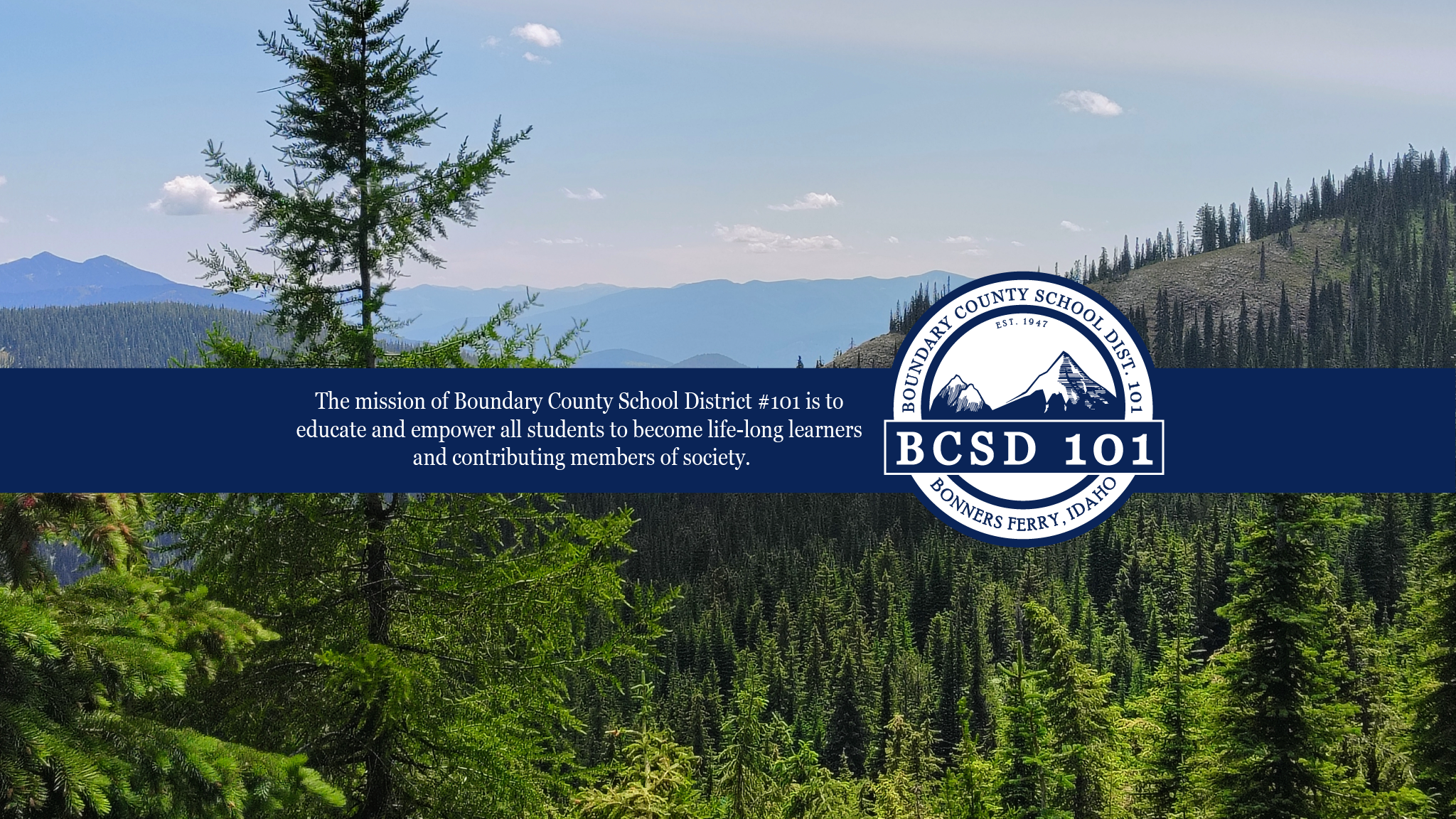 Picture of mountain range and evergreen trees, with BCSD #101 logo and the mission statement which reads "The mission of Boundary County School District #101 is to educate and empower all students to become life-long learners and contributing members of society."