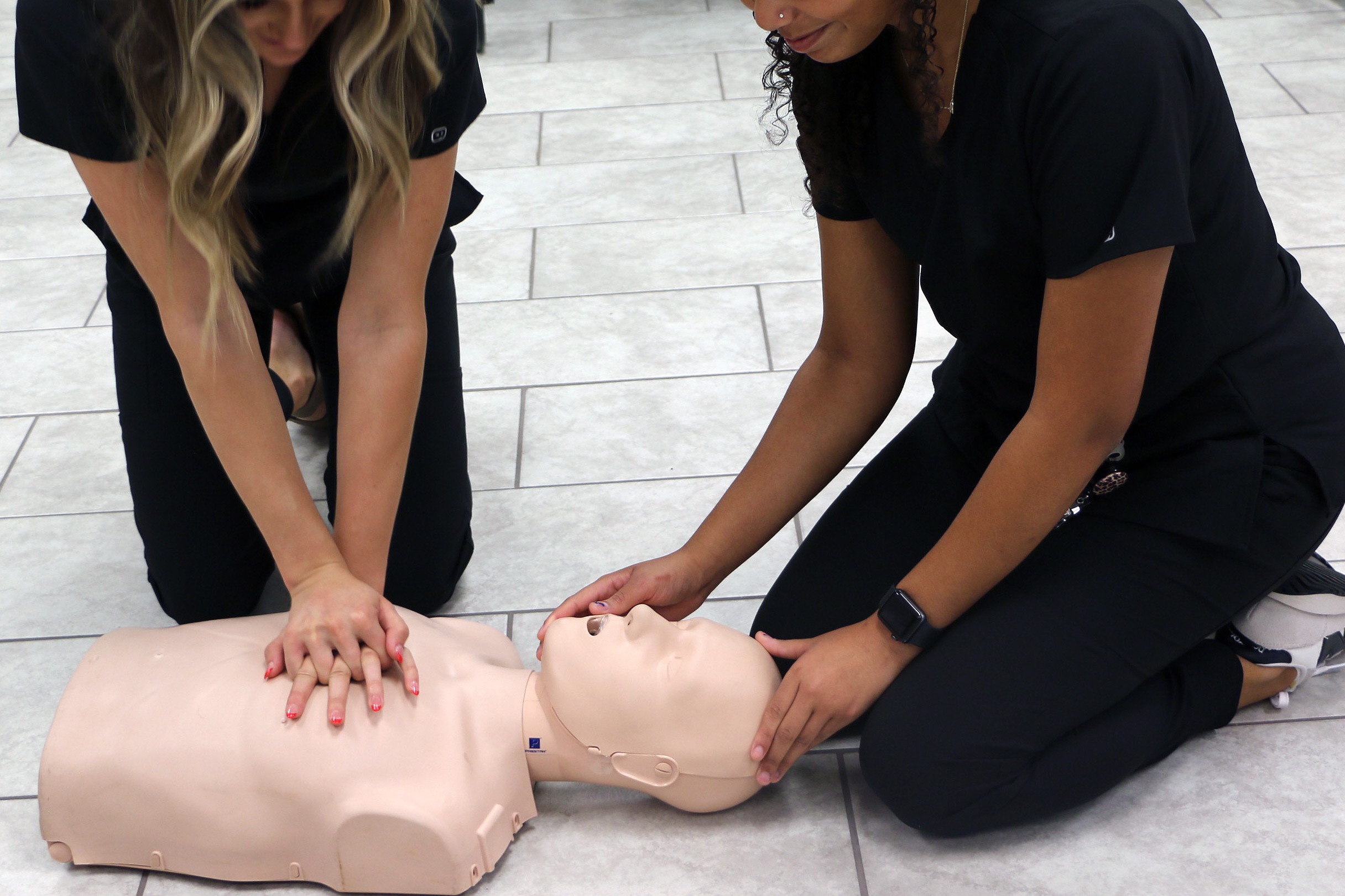 HCC students practice CPR on a dummy. 
