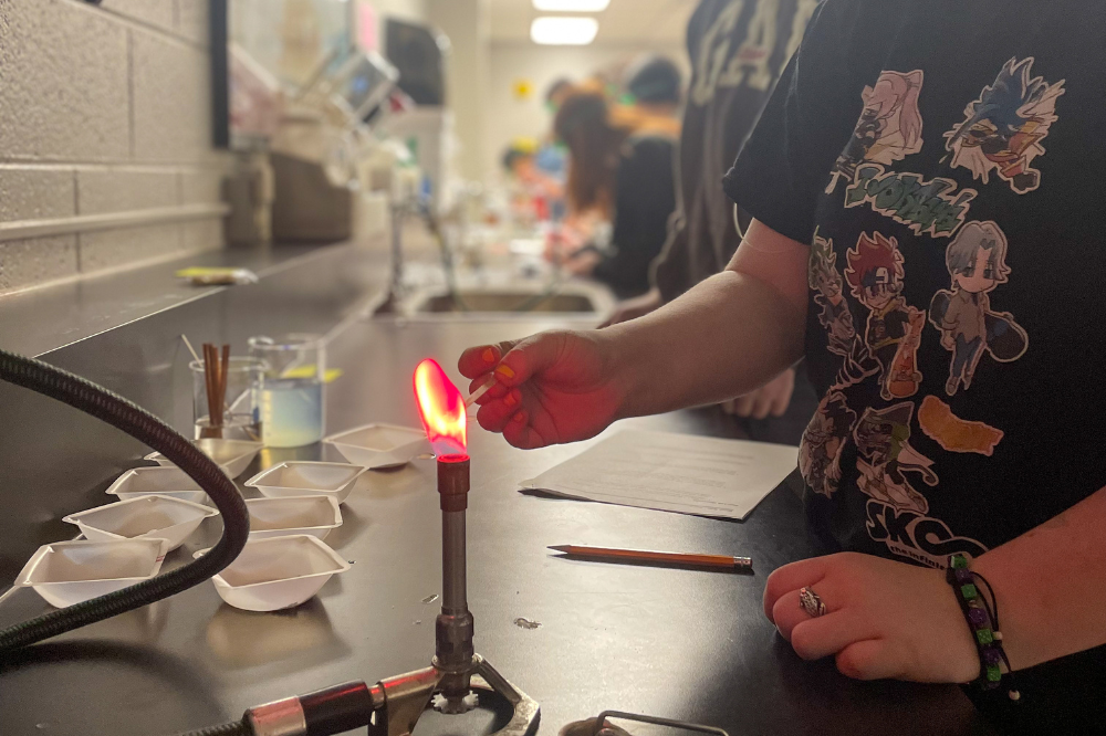 Pre-Engineering student conducting a chemistry experiments.