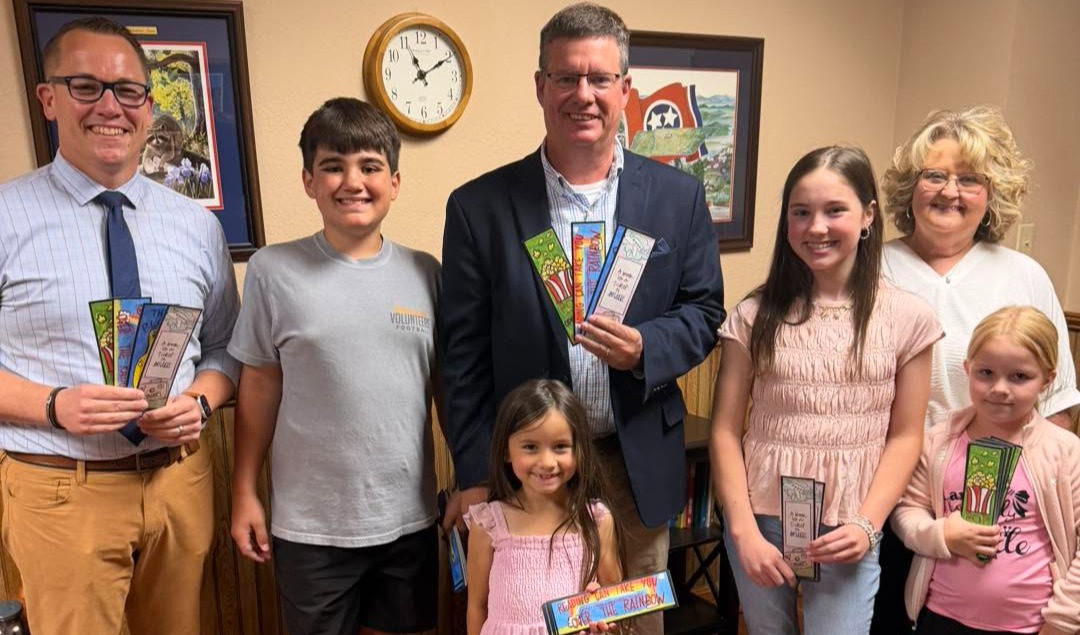 Hillcrest bookmark winners with Director and Asst. Director of Schools