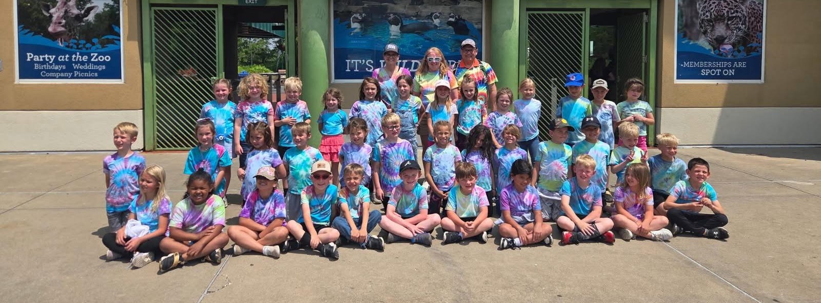 Students taking a group picture on a field trip