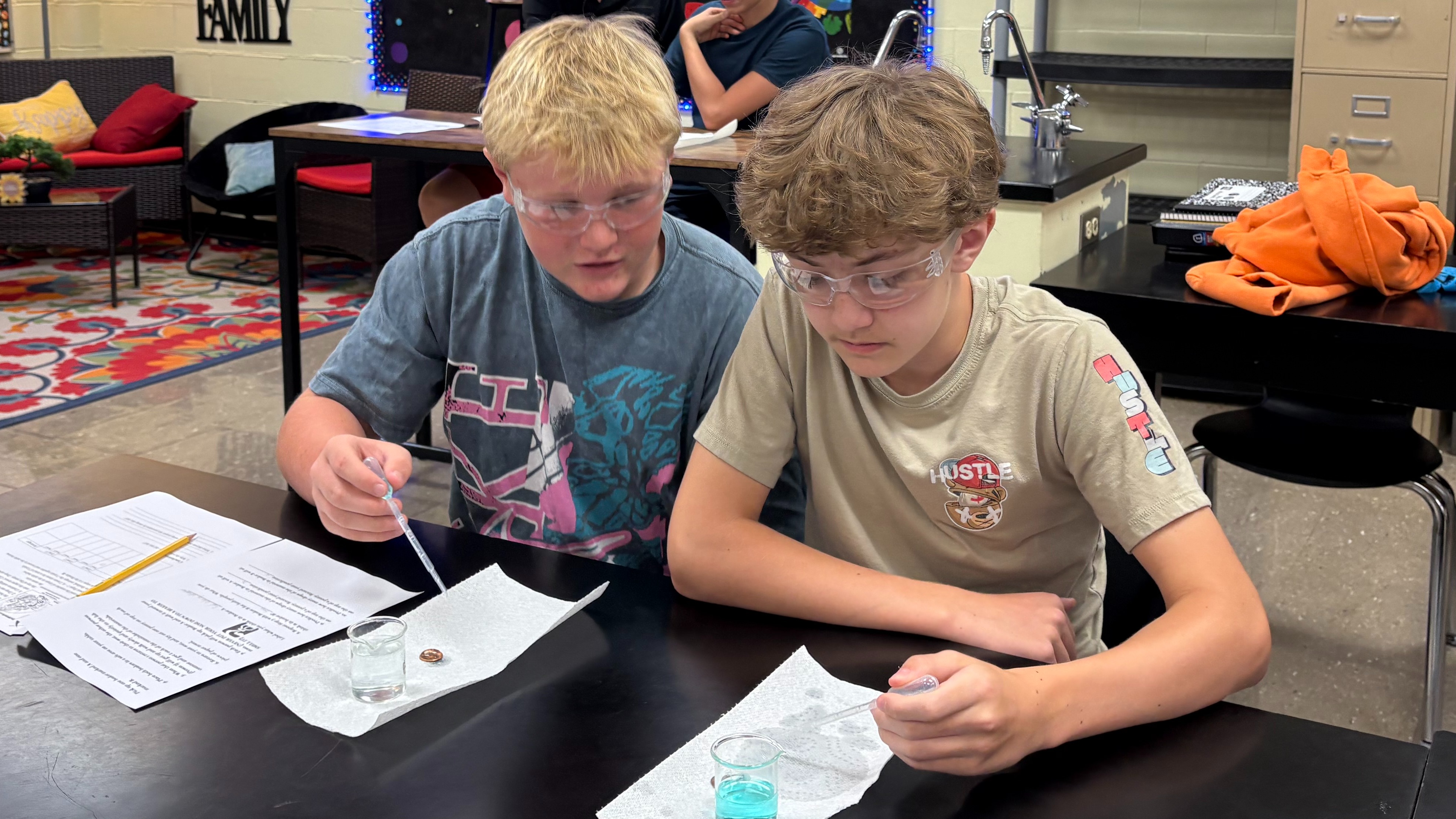 Students working in a CMS 7th grade sciencce classroom