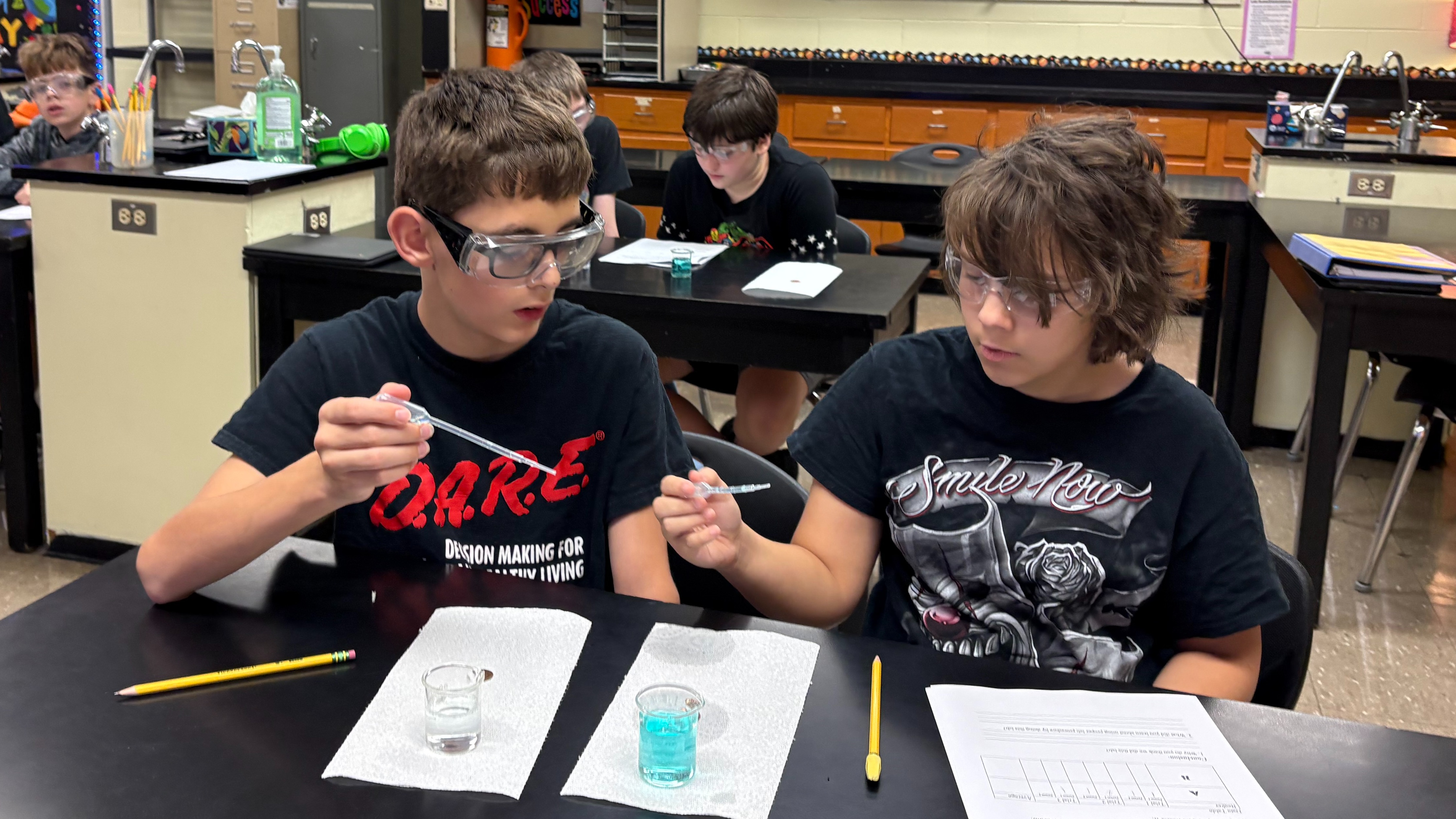 Students working in a 7th grade science classroom.