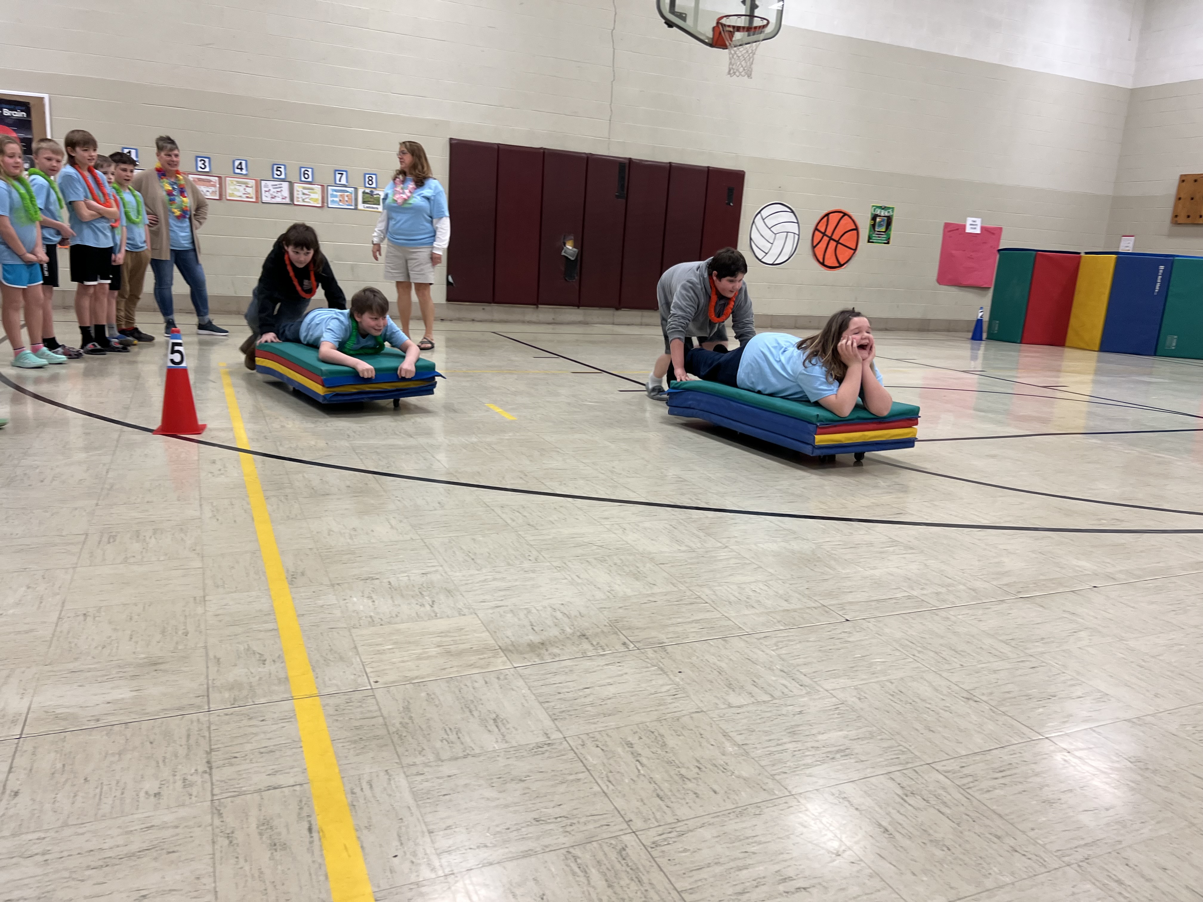 students participating in a "surfing" PE activity