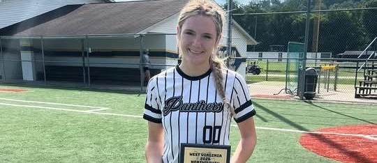 Girl in softball uniform for Tug Valley