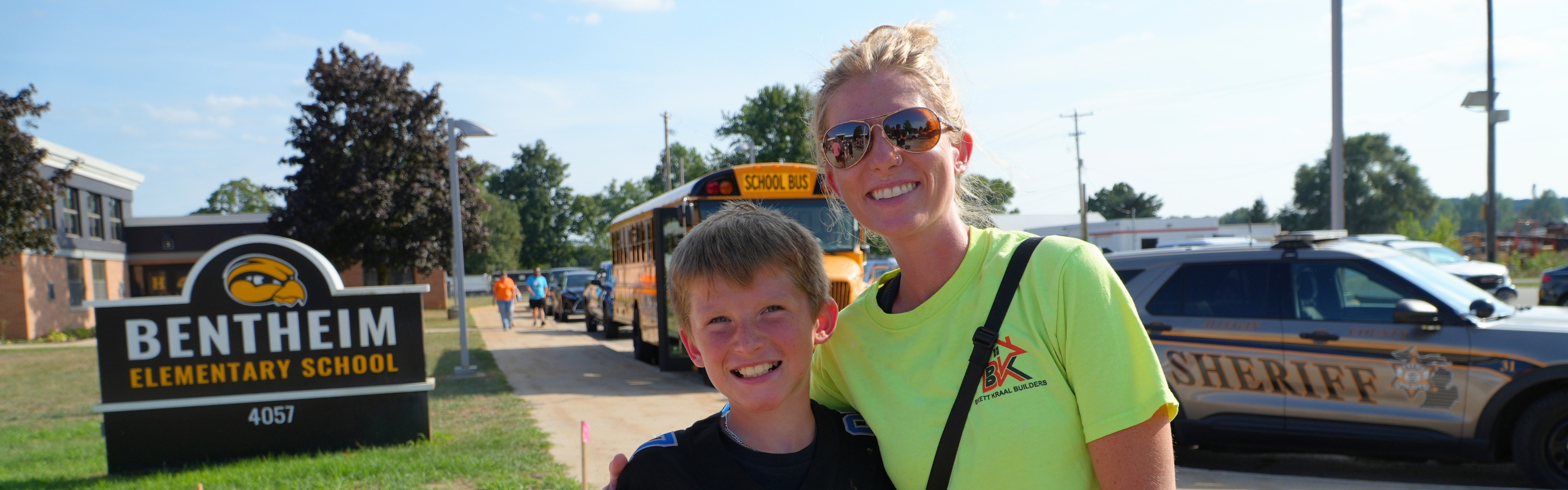 A smiling family outside of Bentheim Elementary.