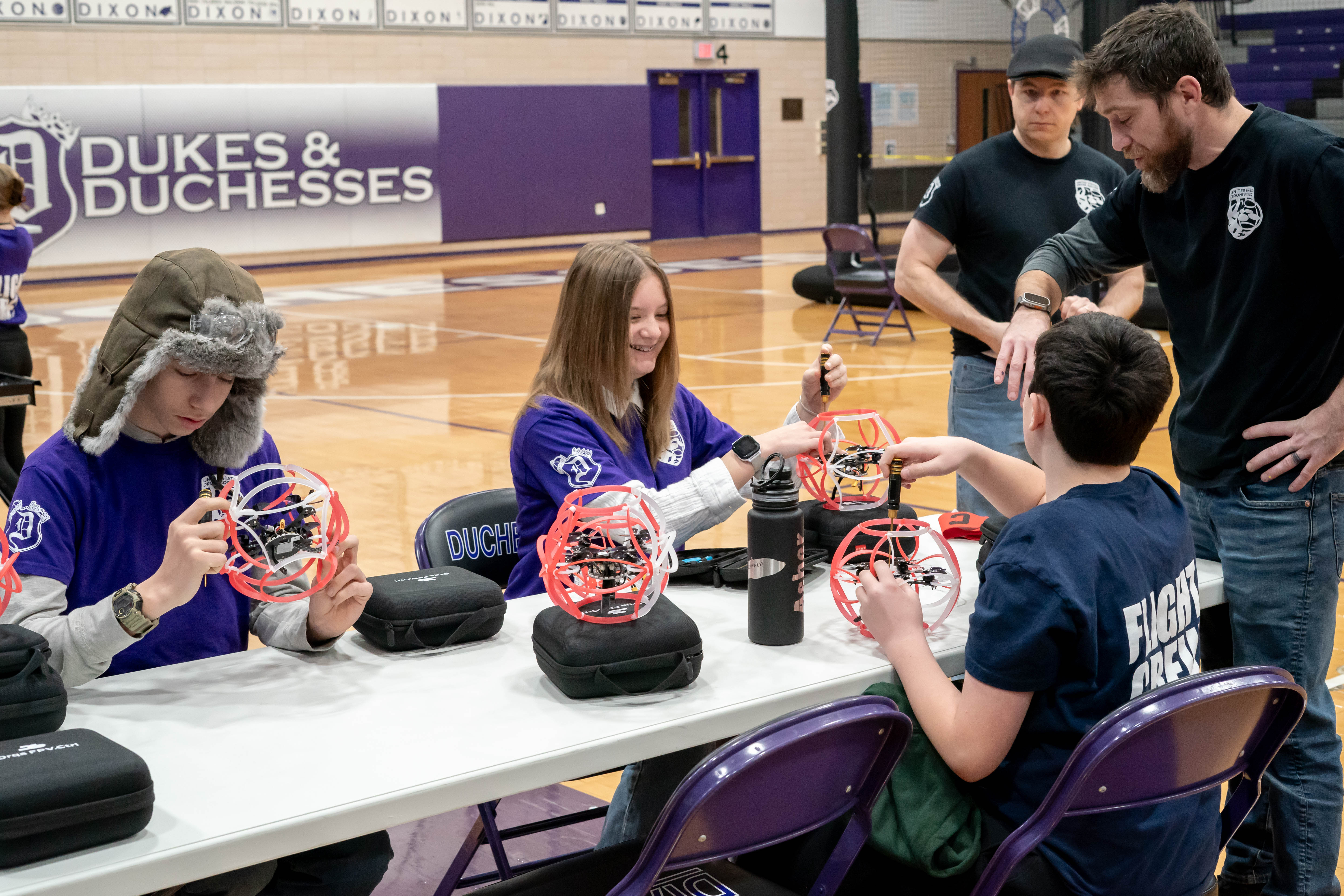 Photo of coaches and students