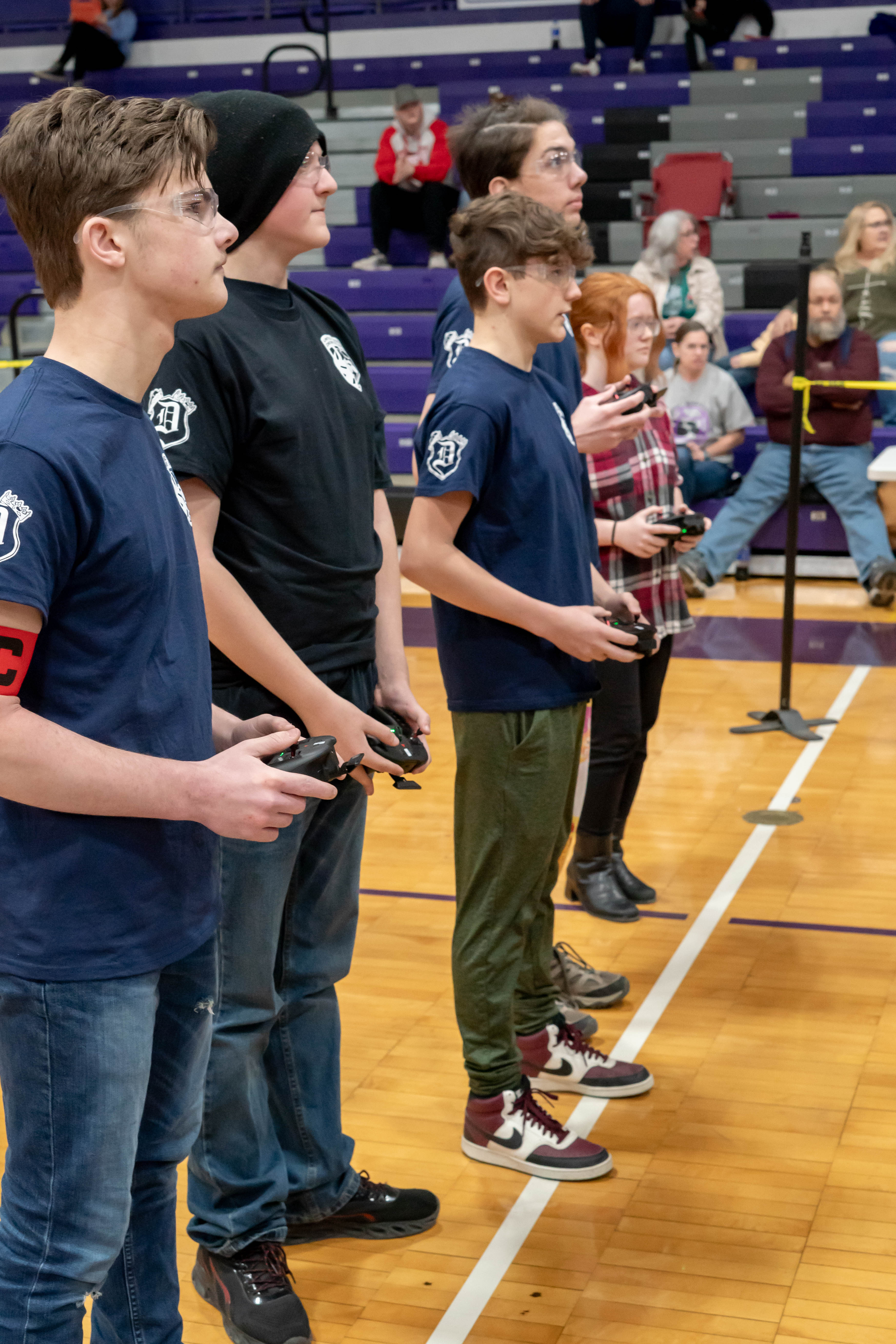 Photo of students with remote controls