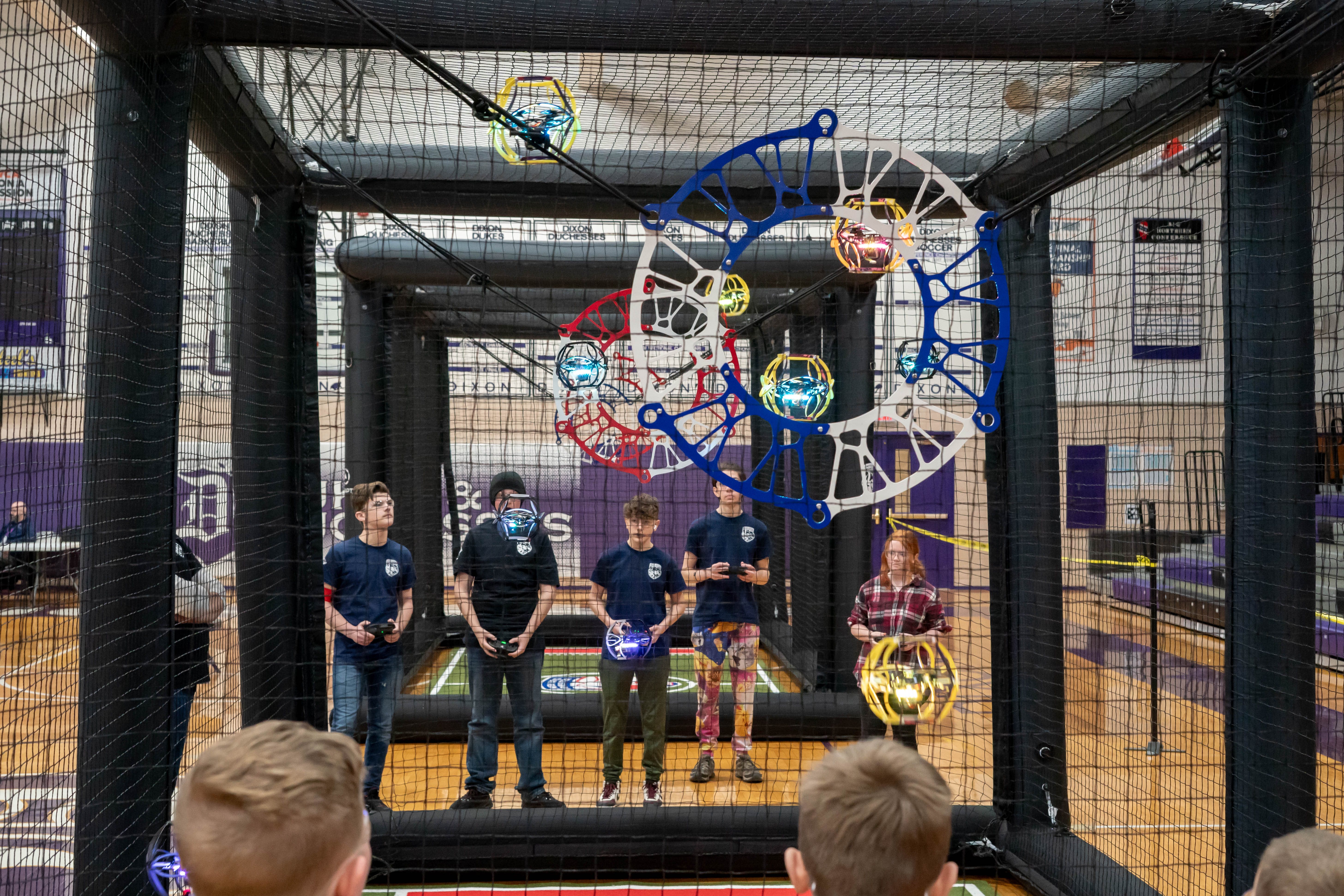 Photo of drone soccer arena play