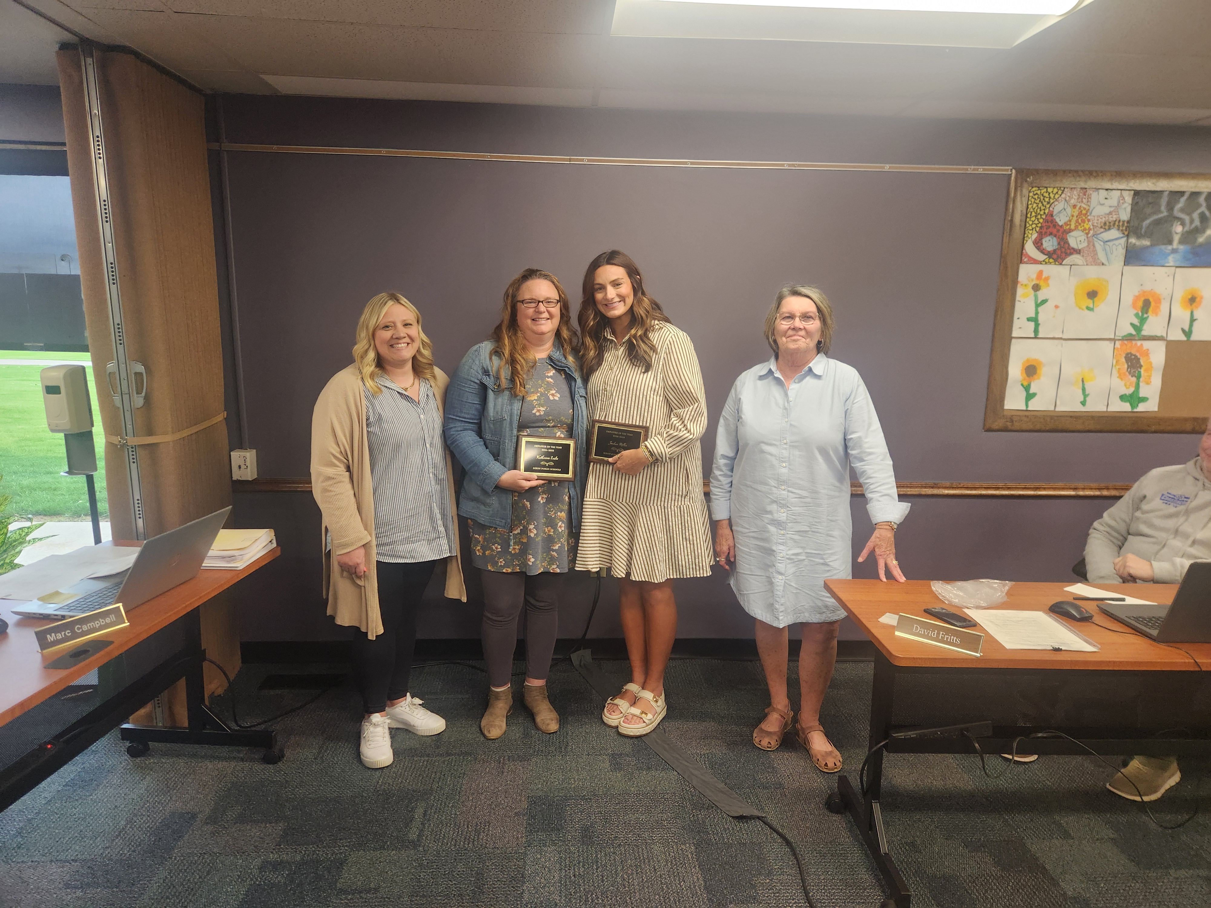 Photo of employees of the year with the board president and Washington principal
