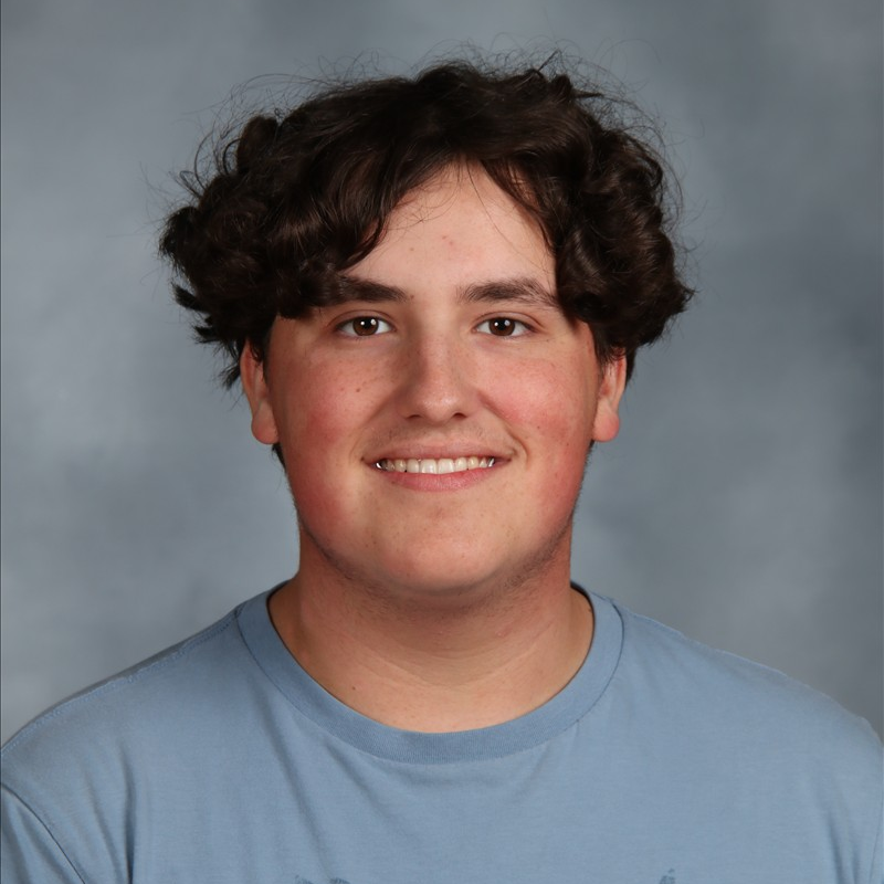 Gage Farster smiling at camera