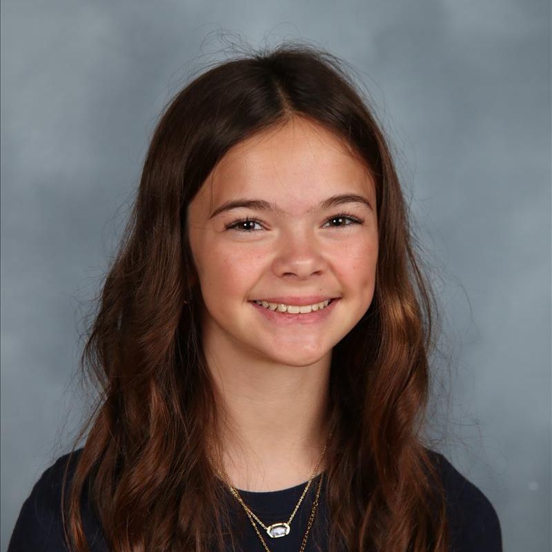 student of the month smiling for camera